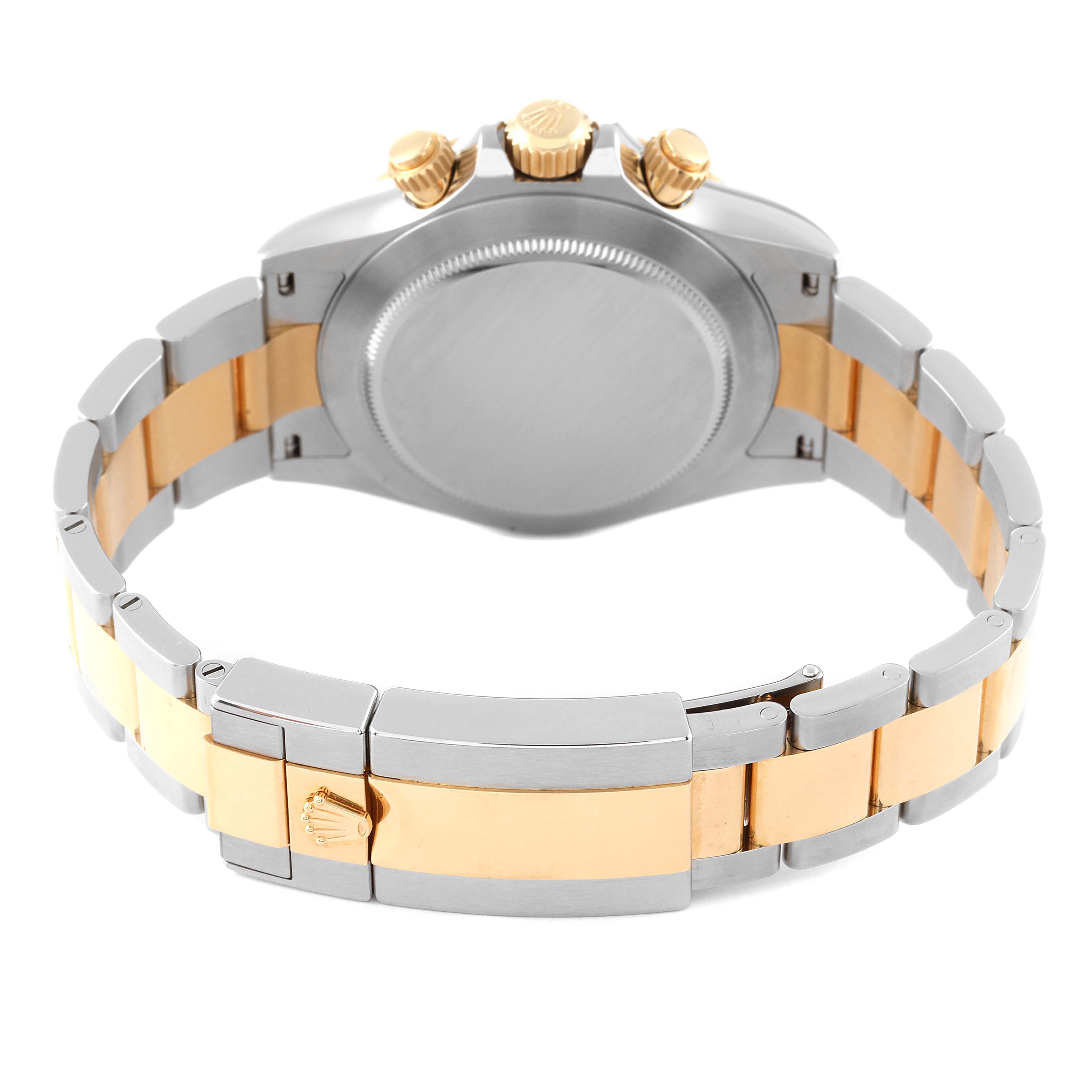 The image shows the back case and bracelet of a Rolex Daytona 116503 Men's Steel and Gold (two tone) Champagne Dial 116503 Men's Steel and Gold (two tone) Champagne Dial watch in a stainless steel and gold combination, viewed from behind.