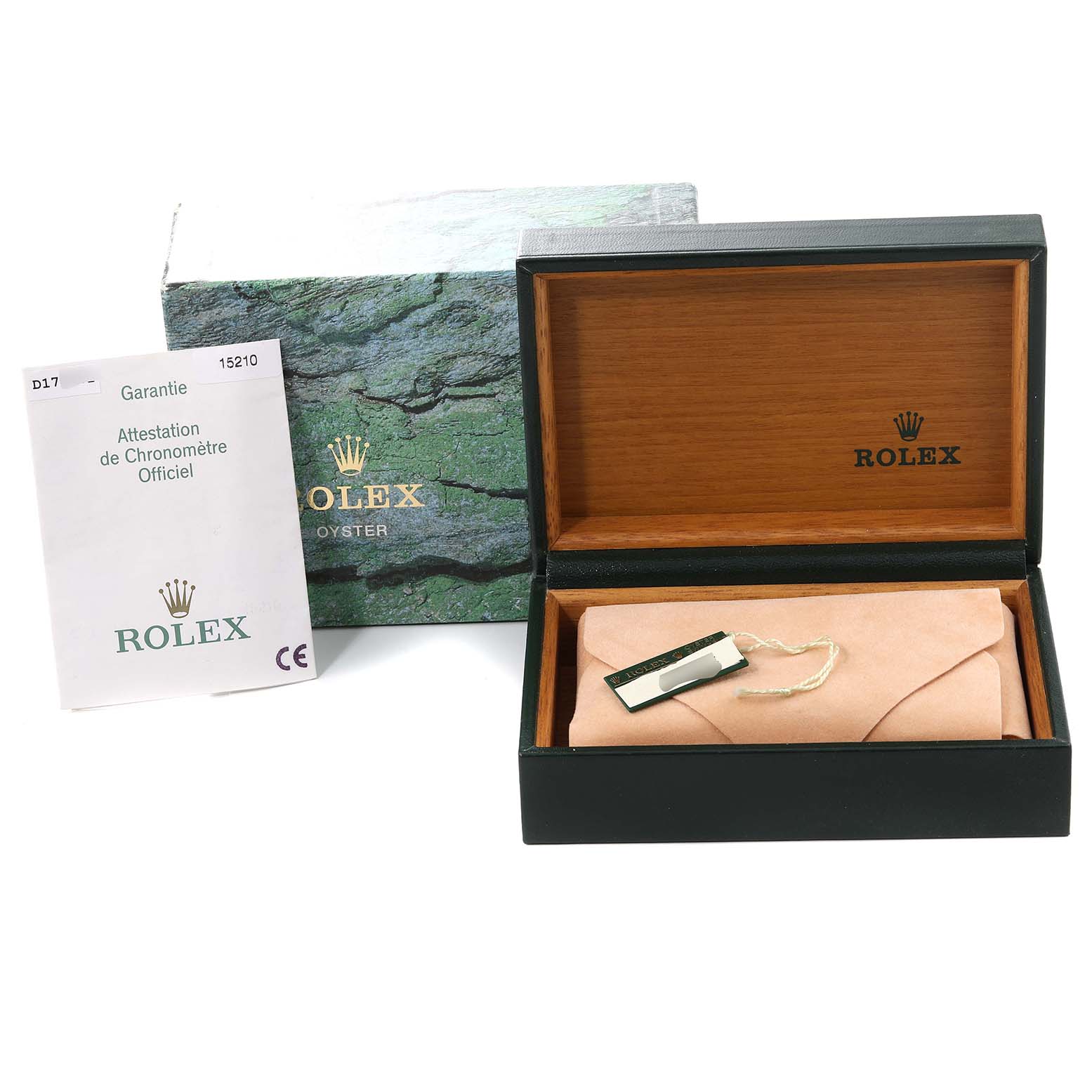 This image shows a Rolex Date 15210 Men's Stainless Steel Black Dial 15210 Men's Stainless Steel Black Dial model watch packaging including the box, warranty card, and an envelope with a tag.