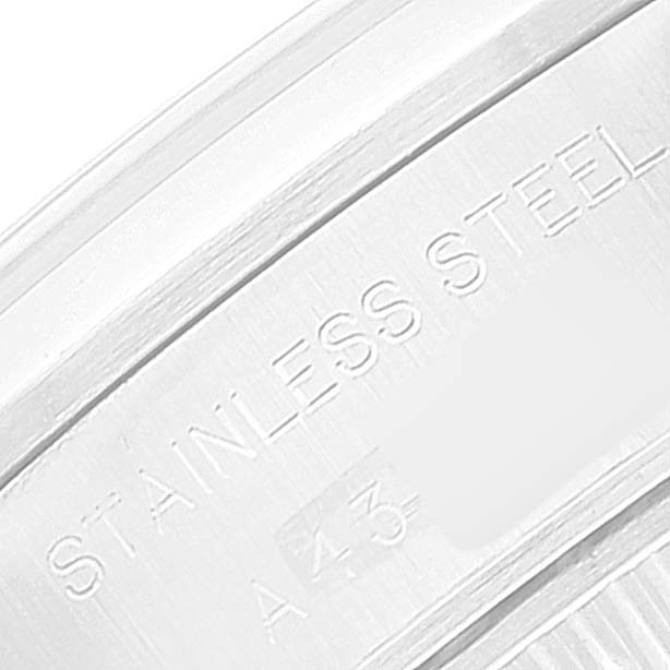 Close-up of the stainless steel case with engravings on the Rolex Date 69160 Women
s Stainless Steel Blue Dial 69160 Women
s Stainless Steel Blue Dial model watch.