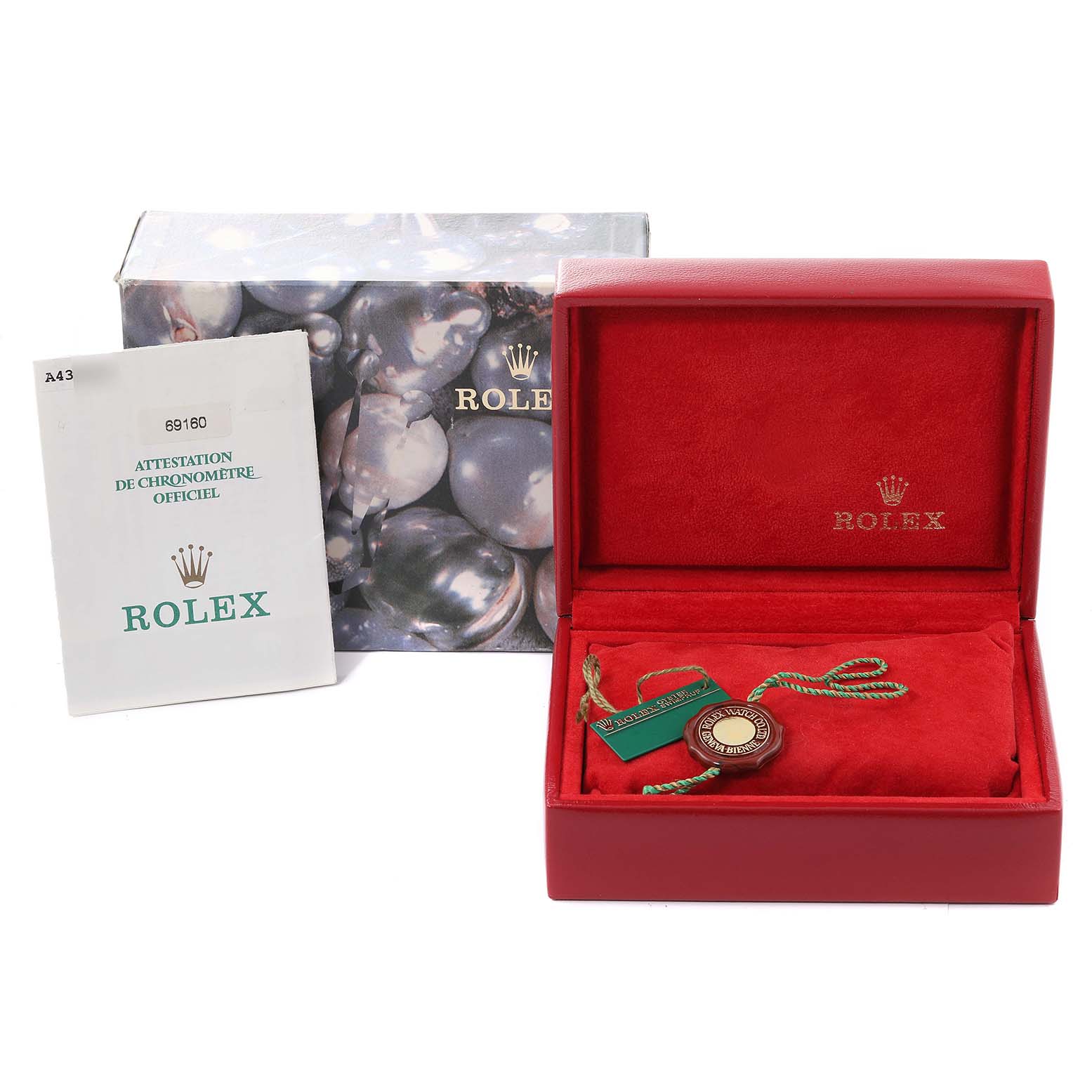 This image shows the box, certificate, and tags for a Rolex Date 69160 Women
s Stainless Steel Blue Dial 69160 Women
s Stainless Steel Blue Dial model watch.