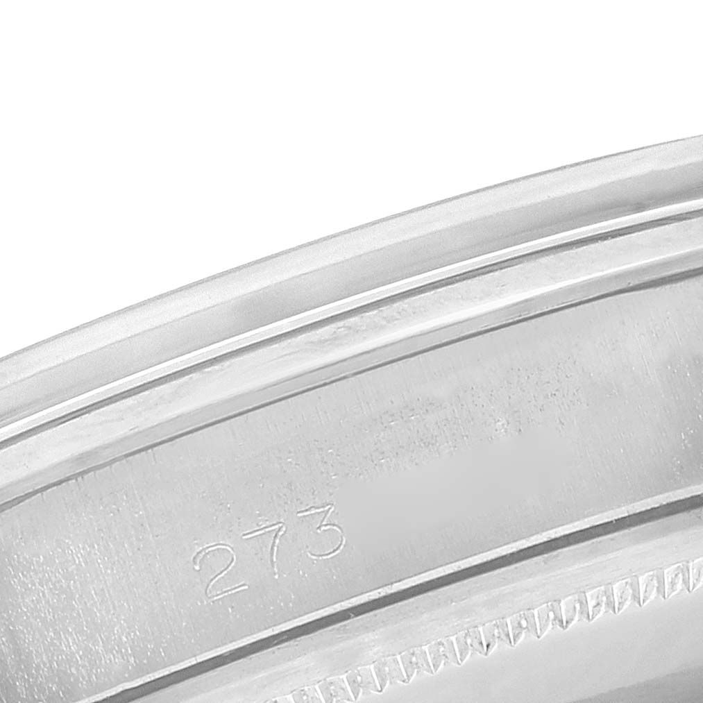 This close-up image showcases the engraved edge of a Rolex Vintage Collection 1500 Men
s Stainless Steel Silver Dial 1500 Men
s Stainless Steel Silver Dial model watch bezel.