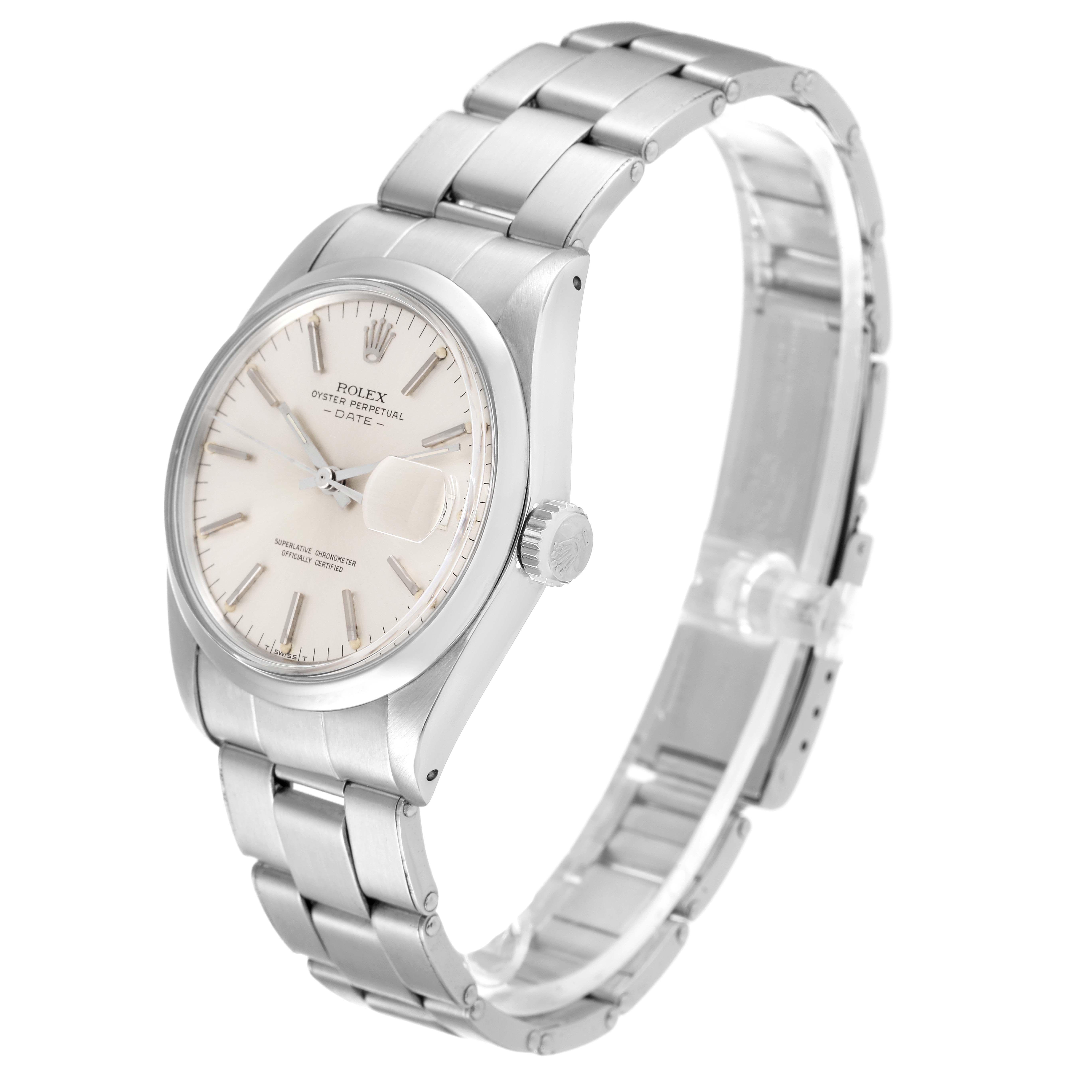 The image shows a side and slightly top angle view of a Rolex Vintage Collection 1500 Men
s Stainless Steel Silver Dial 1500 Men
s Stainless Steel Silver Dial Oyster Perpetual Date watch, featuring the face, crown, and bracelet.