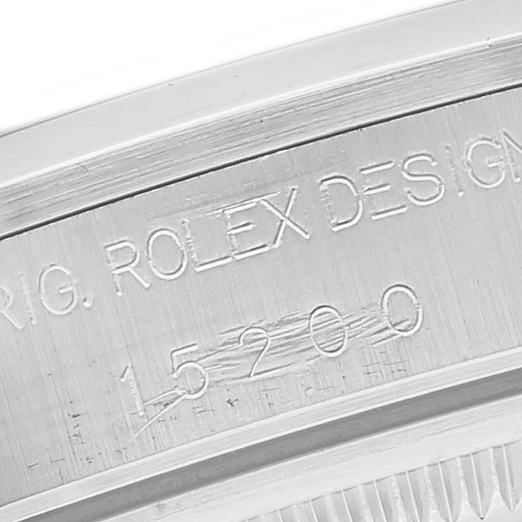 This image shows a close-up of the engraved reference number "15200" on the case of a Rolex Date 15200 Men's Stainless Steel White Dial 15200 Men's Stainless Steel White Dial model watch.