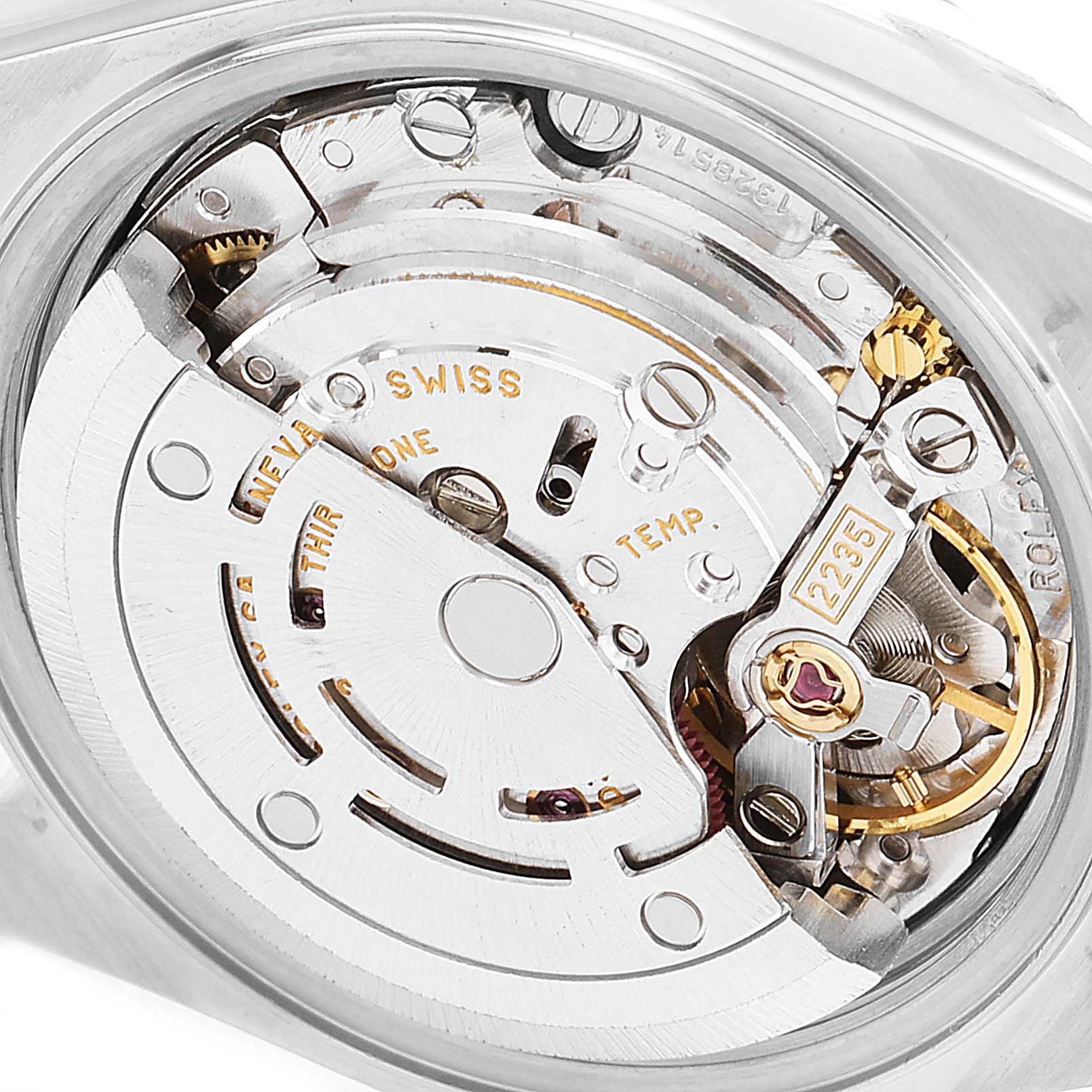 This is a macro shot showing the intricate movement and inner mechanisms of a Rolex Datejust 79173 Women's Steel and Gold (two tone) White Dial 79173 Women's Steel and Gold (two tone) White Dial watch.