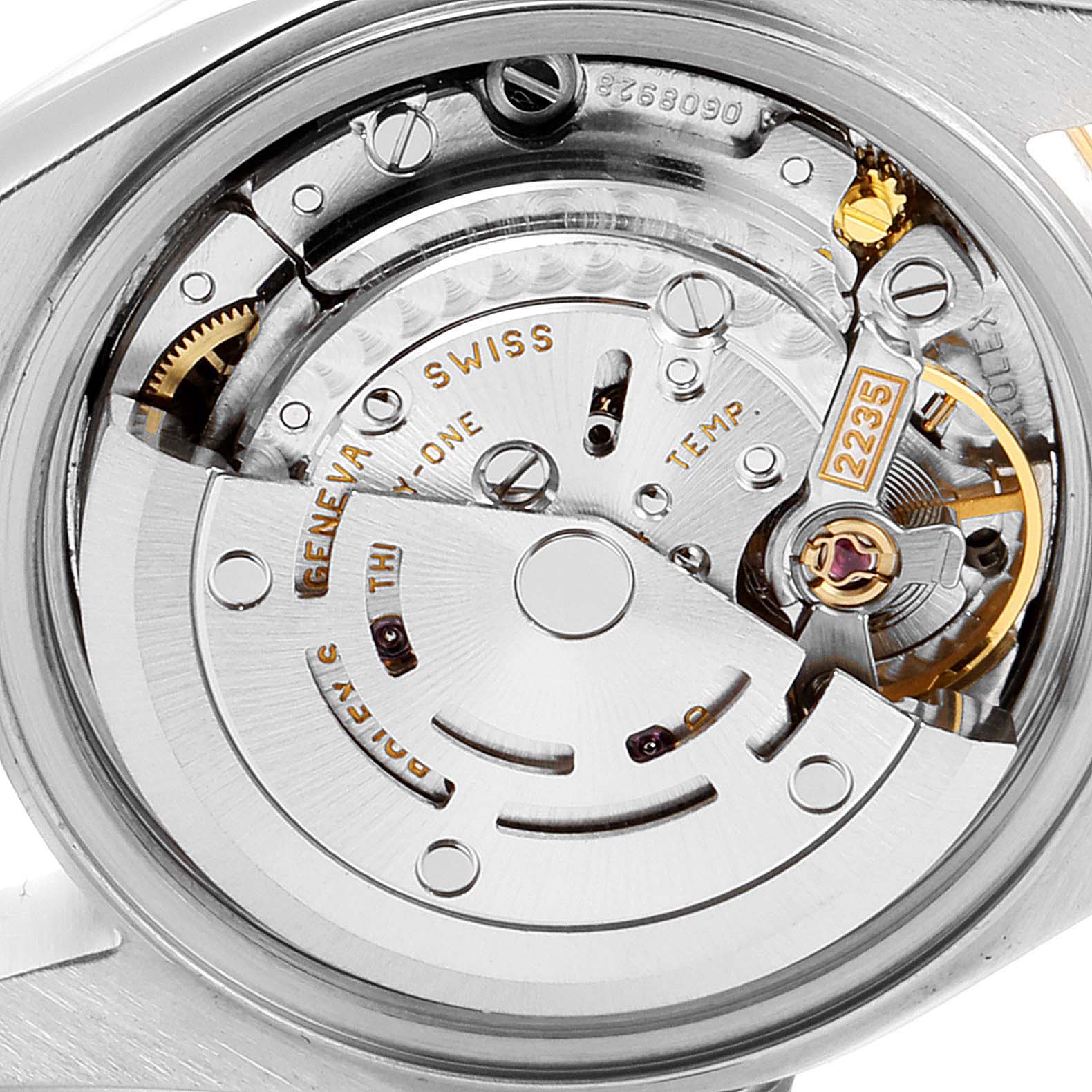 This image shows the intricate movement and inner mechanics of a Rolex Datejust 69173 Women's Steel and Gold (two tone) Champagne Dial 69173 Women's Steel and Gold (two tone) Champagne Dial watch.