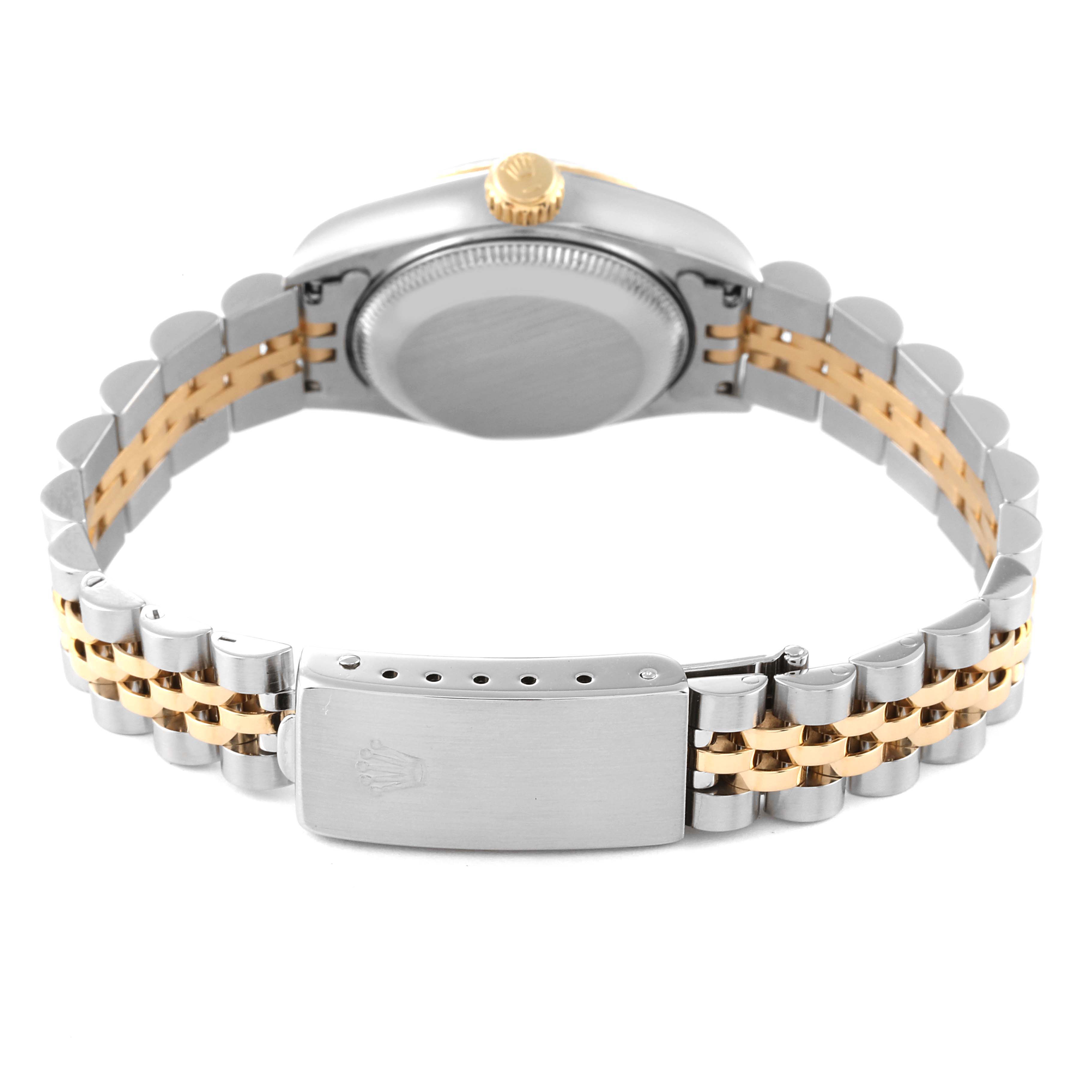 This image shows the back view of a Rolex Datejust 69173 Women's Steel and Gold (two tone) Red Dial 69173 Women's Steel and Gold (two tone) Red Dial watch, highlighting its two-tone bracelet and clasp.