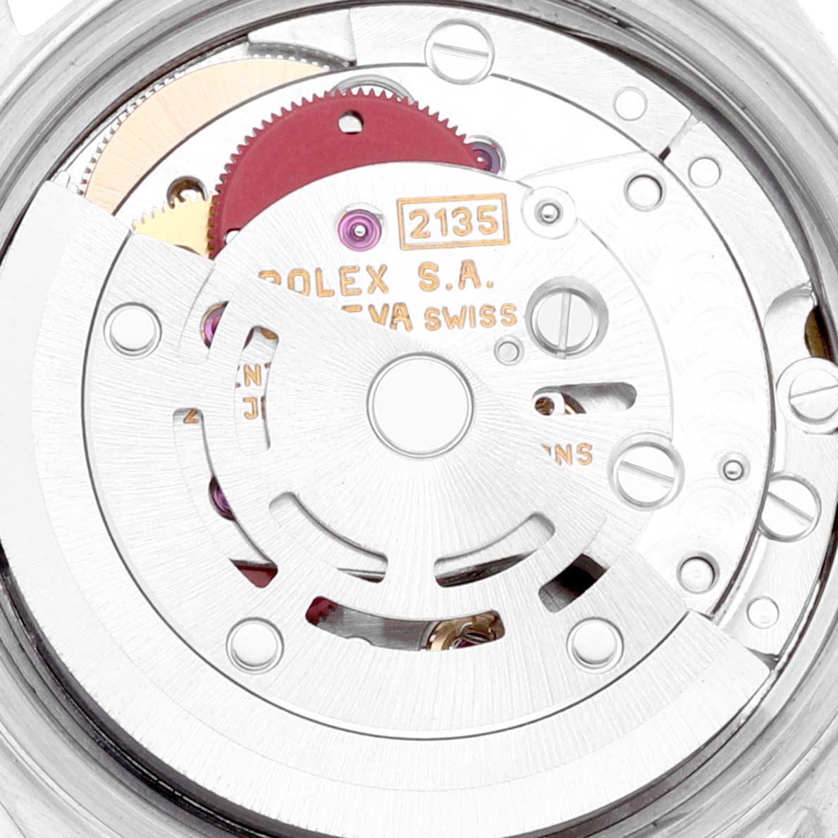The image shows a close-up of the movement mechanism of a Rolex Datejust 69173 Women's Steel and Gold (two tone) Red Dial 69173 Women's Steel and Gold (two tone) Red Dial watch, focusing on the rotor and internal gears.