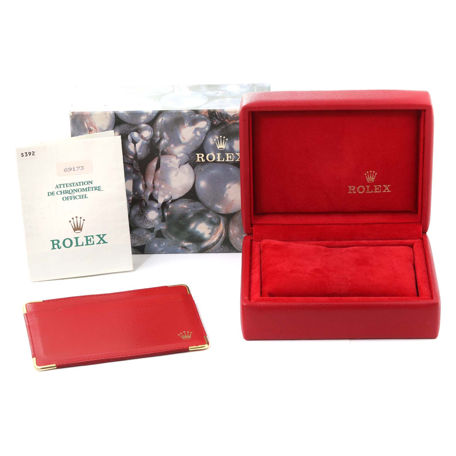 The image shows a Rolex Datejust 69173 Women's Steel and Gold (two tone) Champagne Dial 69173 Women's Steel and Gold (two tone) Champagne Dial watch box, official papers, and packaging components.