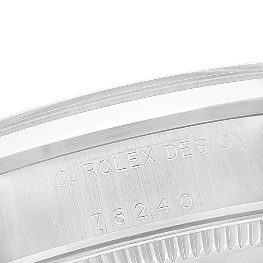 This image shows the engraved side of the bezel and case of a Mid-Size Rolex watch with model number 78240.