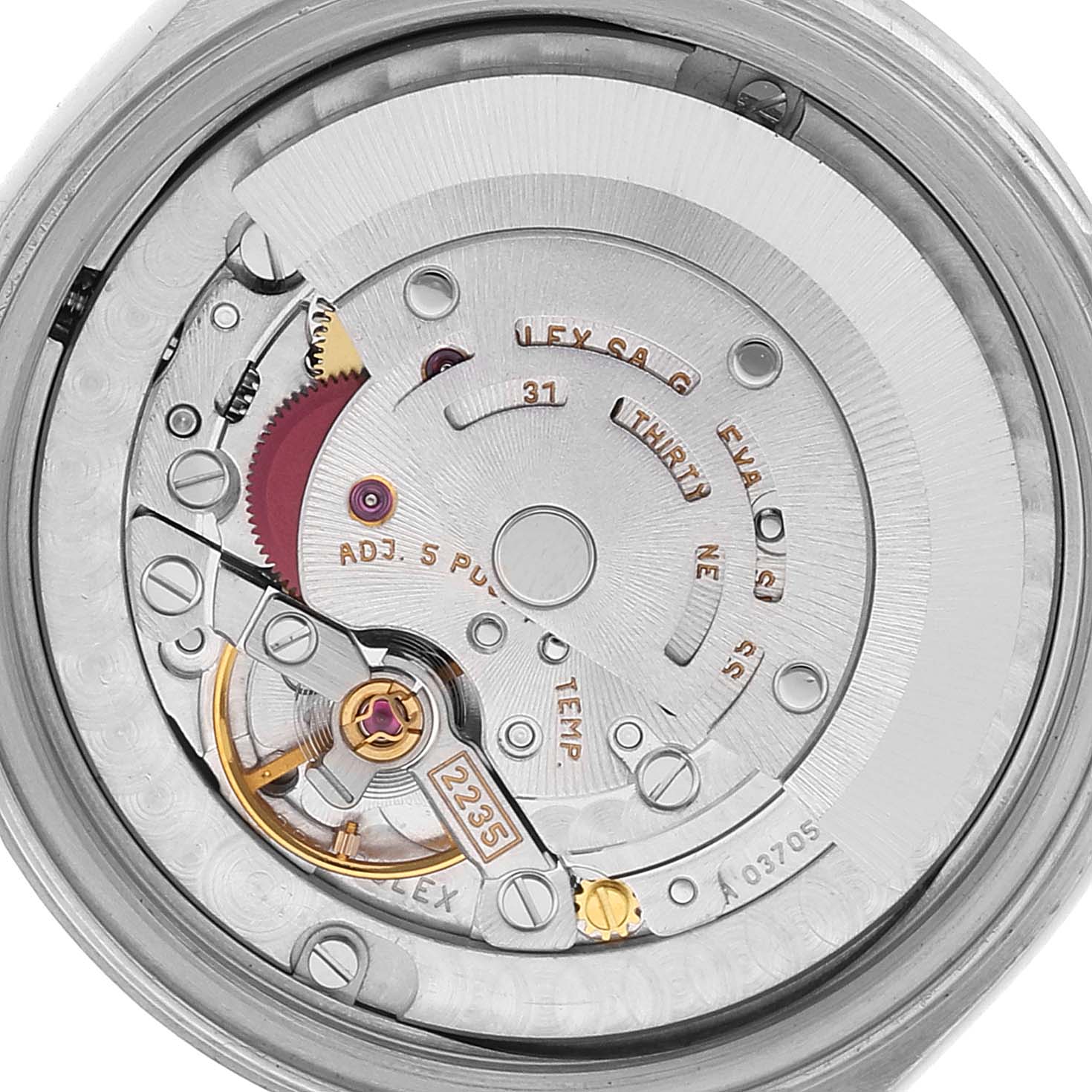 This image shows the internal mechanics and movement of a Mid-Size Rolex watch, viewed from the back.