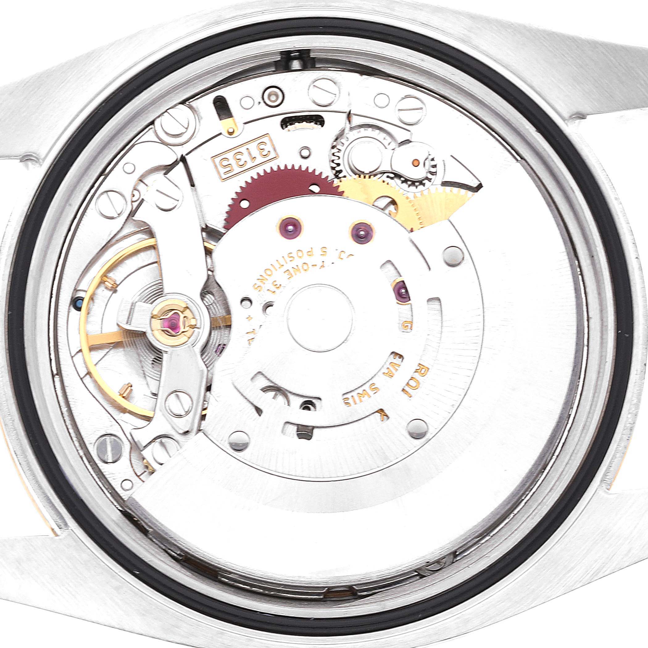 This image shows the internal mechanism of a Rolex Datejust 116233 Men's Steel and Gold (two tone) Champagne Dial 116233 Men's Steel and Gold (two tone) Champagne Dial model watch, viewed from the back with the caseback removed.