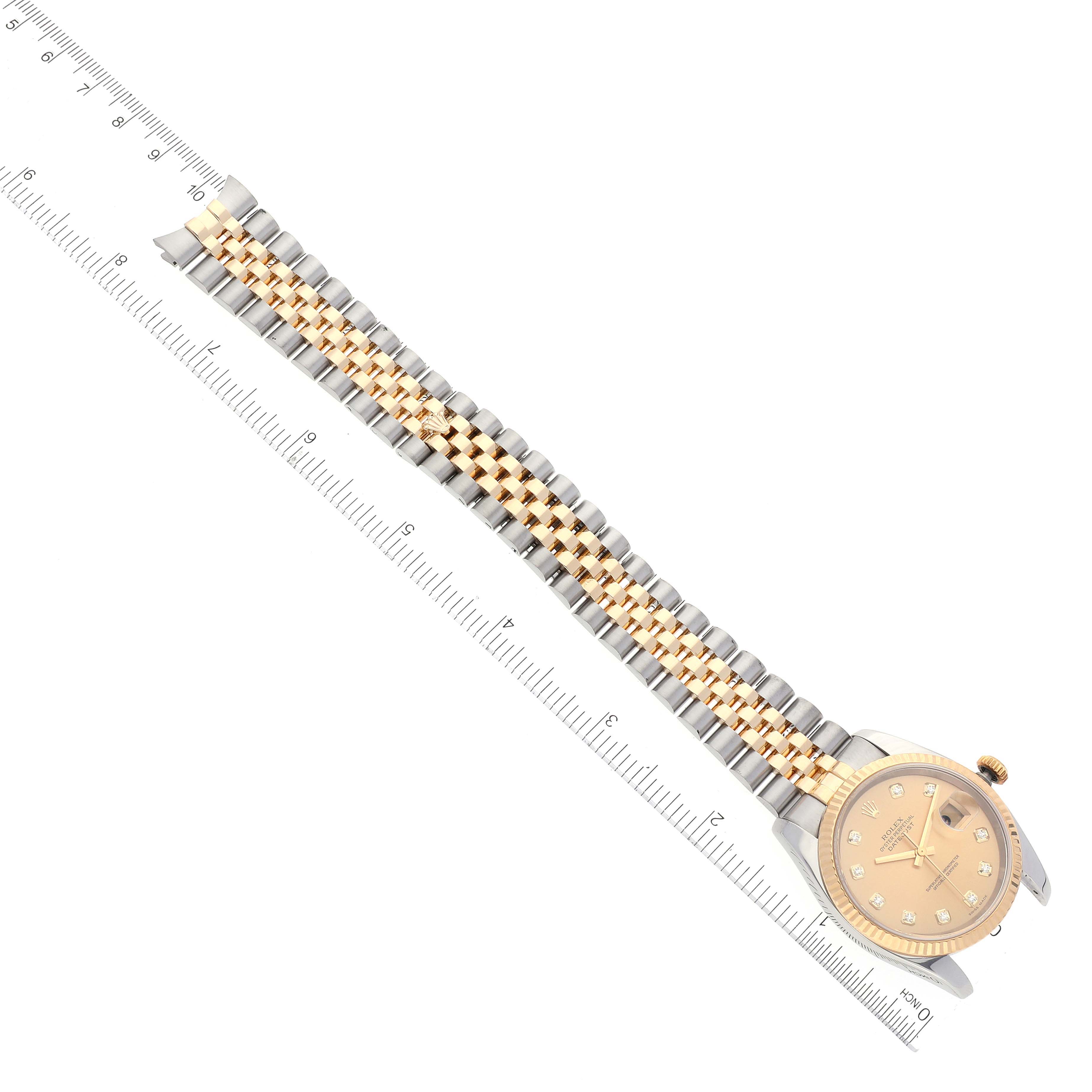 The image shows a Rolex Datejust 116233 Men's Steel and Gold (two tone) Champagne Dial 116233 Men's Steel and Gold (two tone) Champagne Dial watch at a diagonal angle, displaying the face, bezel, and two-tone bracelet.