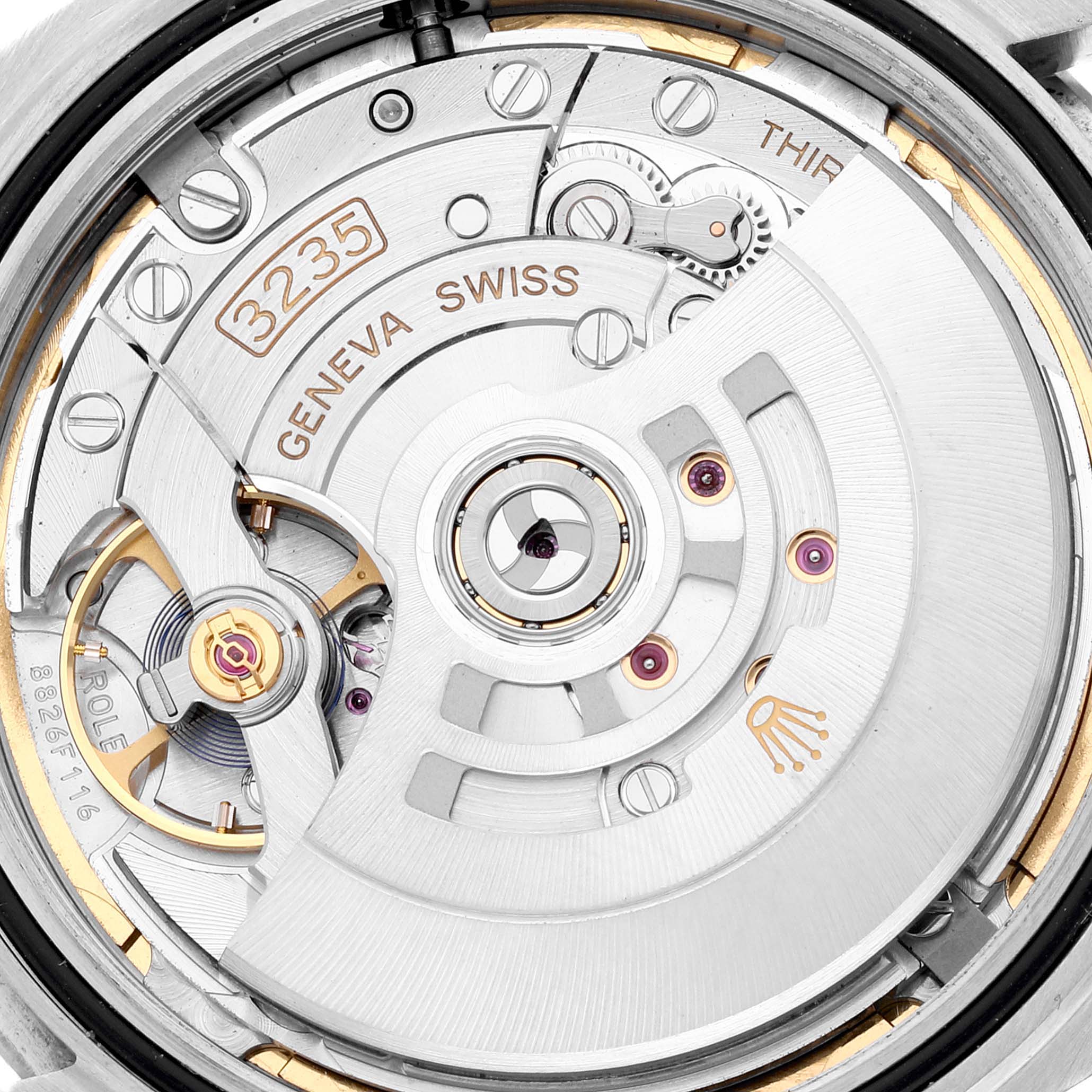 This image shows a close-up of the movement mechanism inside a Rolex Datejust 41 126334 Men
s Stainless Steel Blue Dial 126334 Men
s Stainless Steel Blue Dial watch, including the rotor and components.