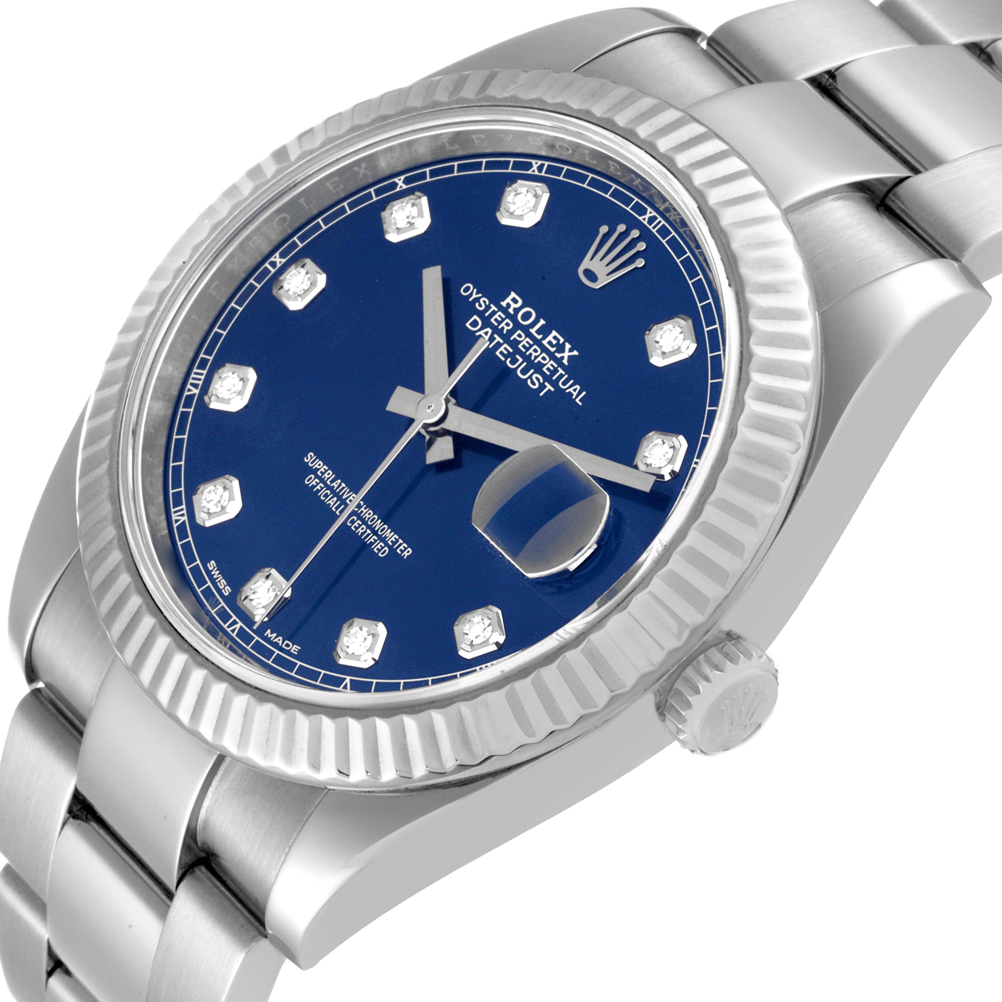 This image shows a close-up of the Rolex Datejust 41 126334 Men
s Stainless Steel Blue Dial 126334 Men
s Stainless Steel Blue Dial watch, highlighting the dial, bezel, bracelet, and crown from a side angle.