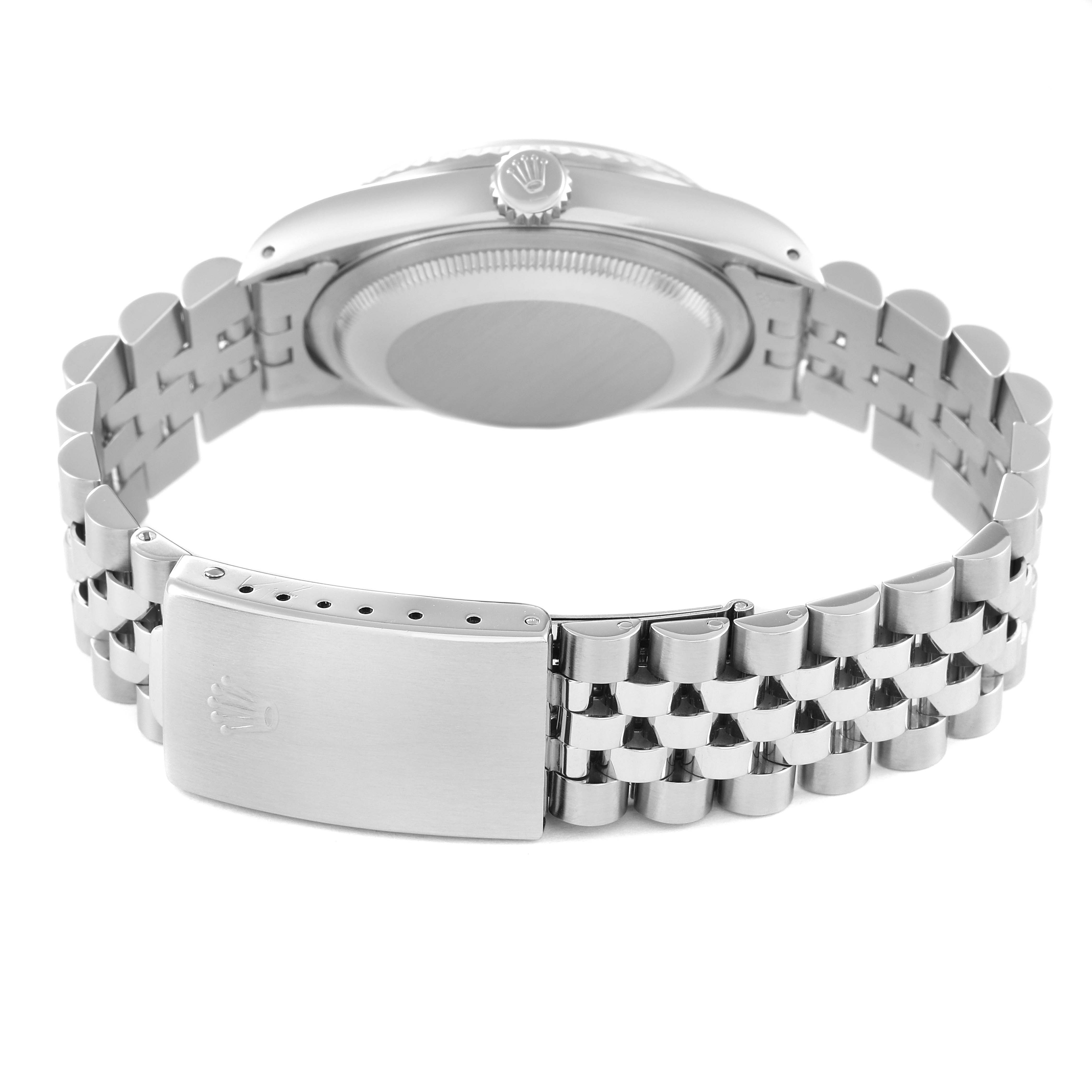 The image shows the back of a Rolex Datejust 16234 Men's Stainless Steel Blue Dial 16234 Men's Stainless Steel Blue Dial watch, highlighting the case back and Jubilee bracelet with a clasp.