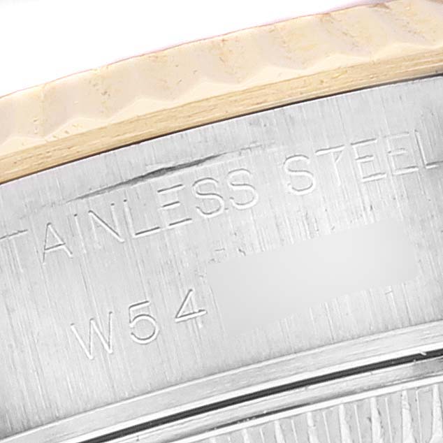 The image shows a close-up of the side of a Rolex Datejust 69173 Women's Steel and Gold (two tone) Blue Dial 69173 Women's Steel and Gold (two tone) Blue Dial watch, highlighting the engraved text on the stainless steel bezel.
