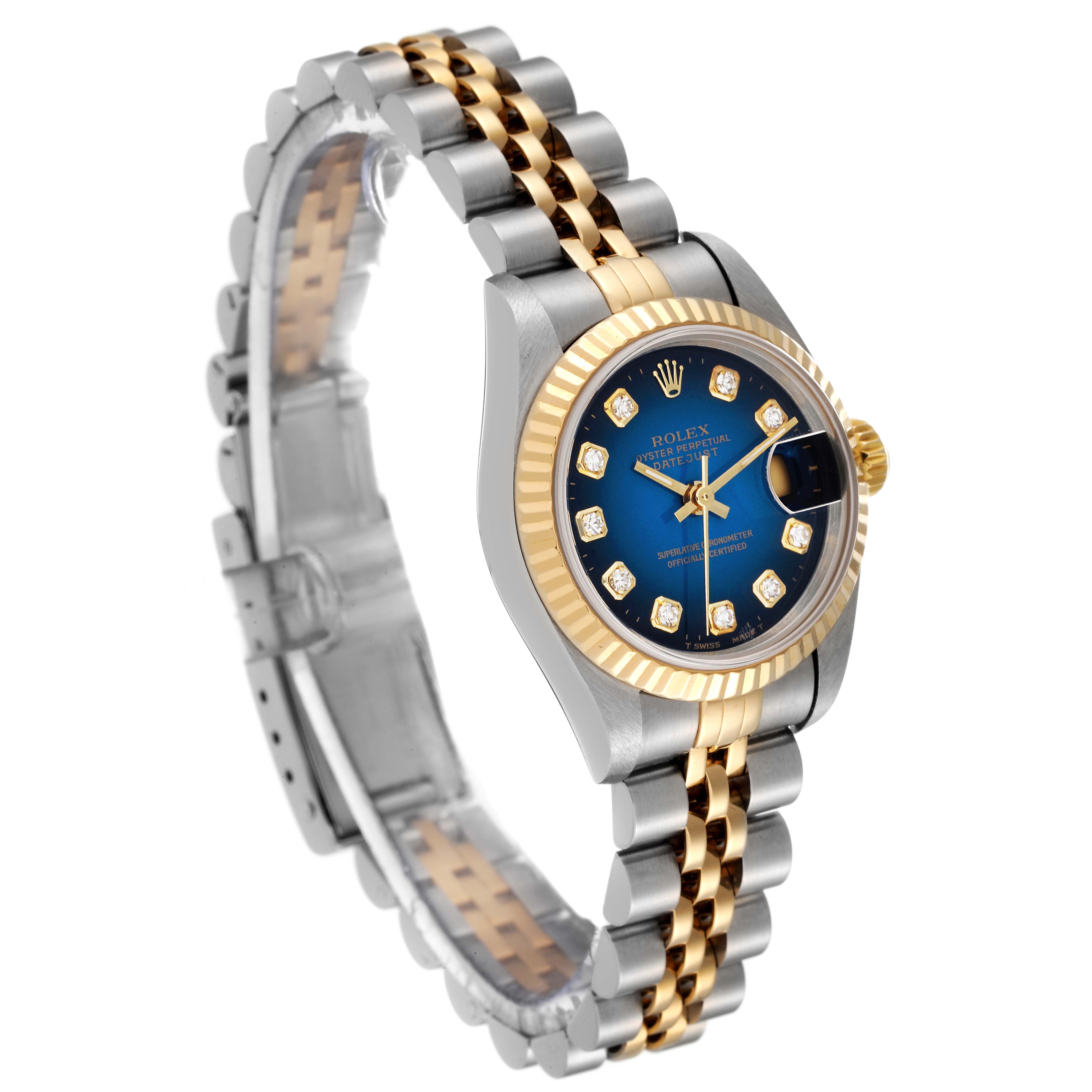 The image shows a Rolex Datejust 69173 Women's Steel and Gold (two tone) Blue Dial 69173 Women's Steel and Gold (two tone) Blue Dial watch at a three-quarter angle, highlighting the blue dial, gold bezel, and two-tone bracelet.