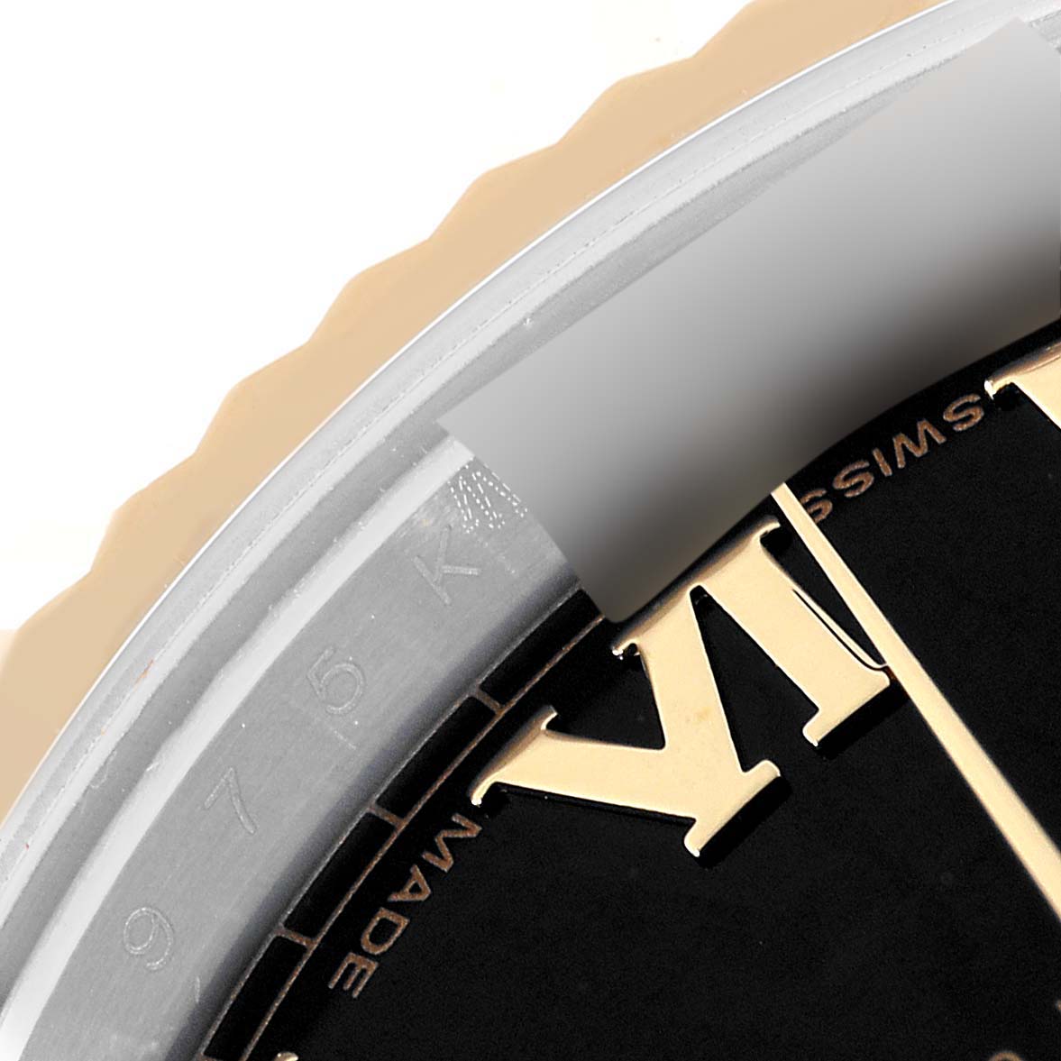 This image shows a close-up of the dial and part of the bezel of a Rolex Datejust 41 116333 Men
s Steel and Gold (two tone) Black Dial 116333 Men
s Steel and Gold (two tone) Black Dial watch.