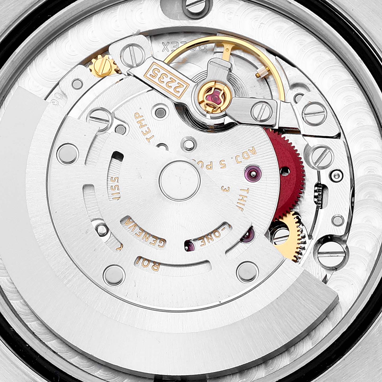 This image shows a close-up view of the internal mechanical movement of a Mid-Size Rolex watch.