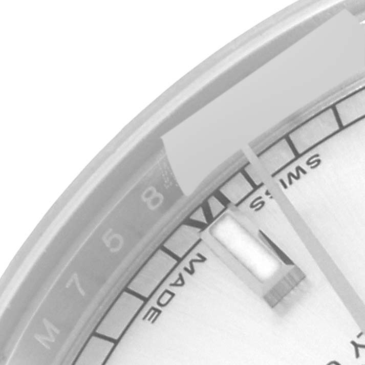 This image shows a close-up of the dial and part of the bezel of a Rolex Mid-Size 178274 Women's Stainless Steel Silver Dial 178274 Women's Stainless Steel Silver Dial watch, highlighting the "SWISS" text and date window.