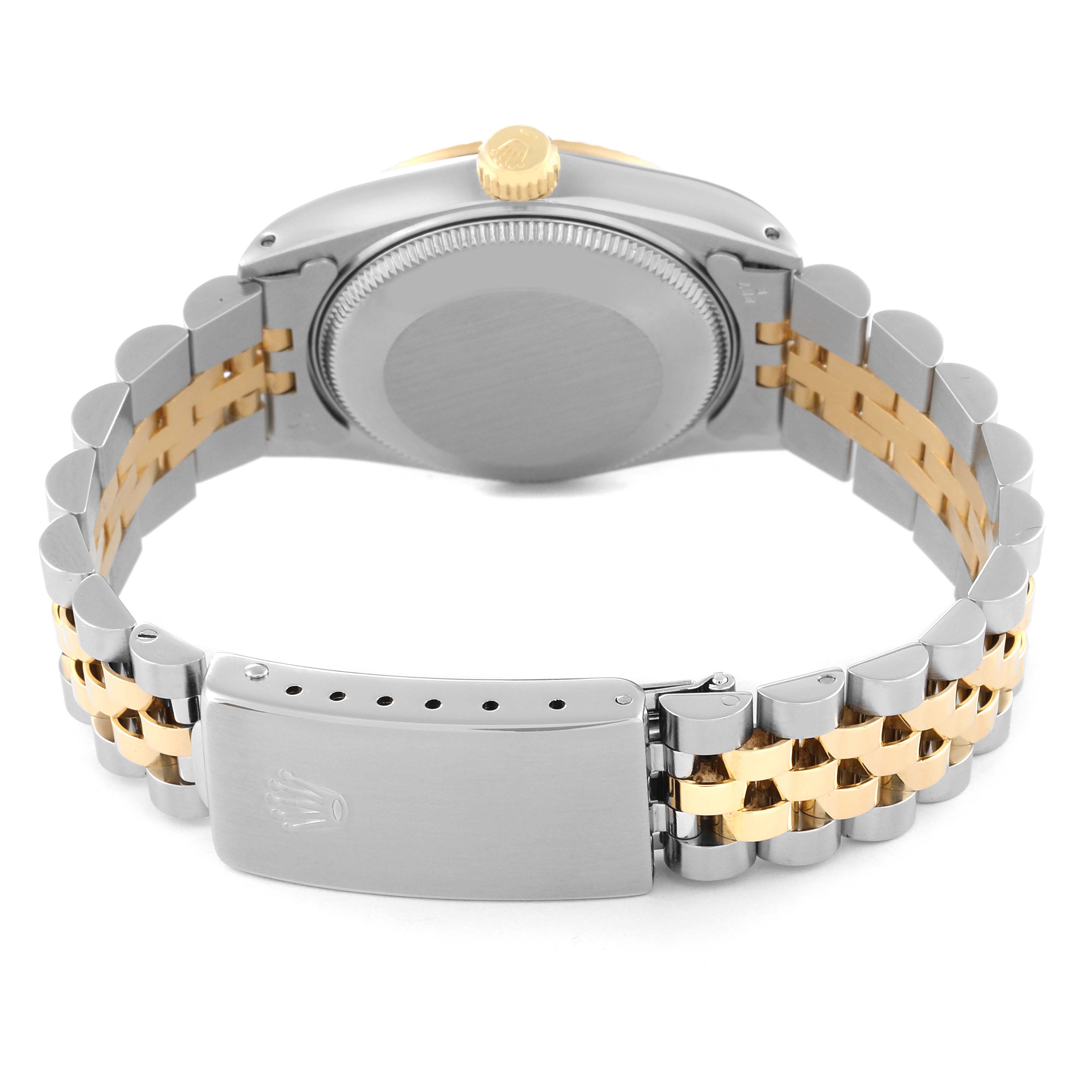 The image shows the back view of a Mid-Size Rolex watch focusing on the case back, bracelet, and clasp.