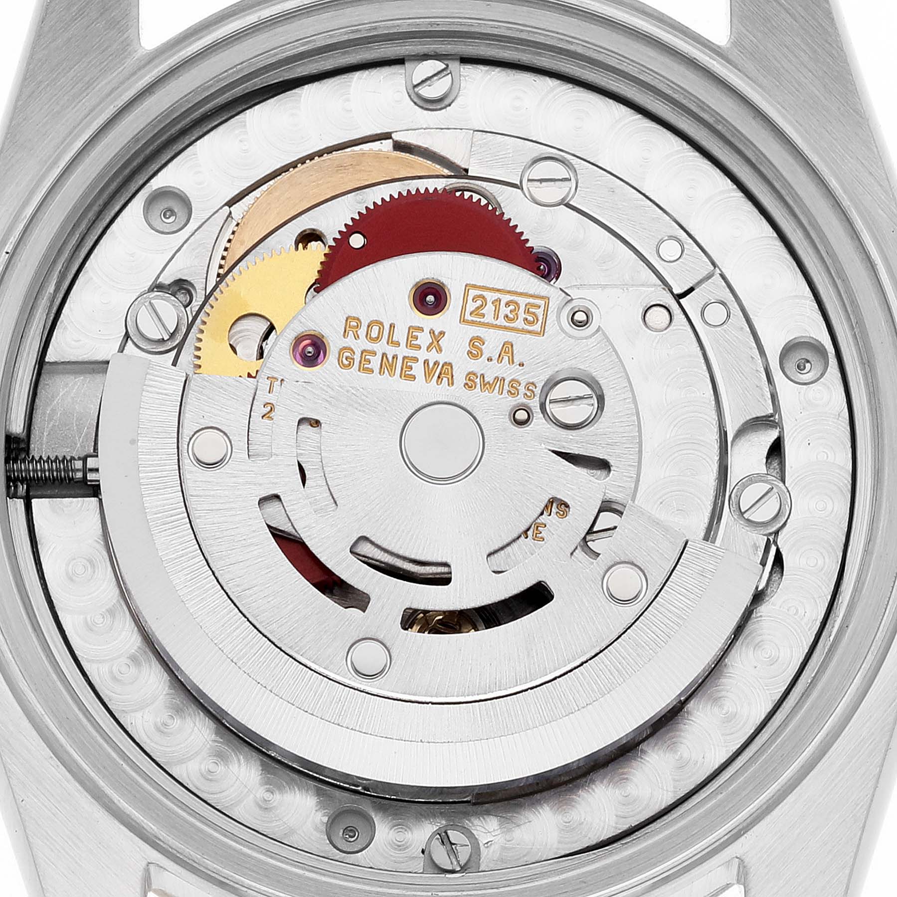 The image shows a close-up view of the movement mechanism of a Mid-Size Rolex watch, highlighting its intricate components.