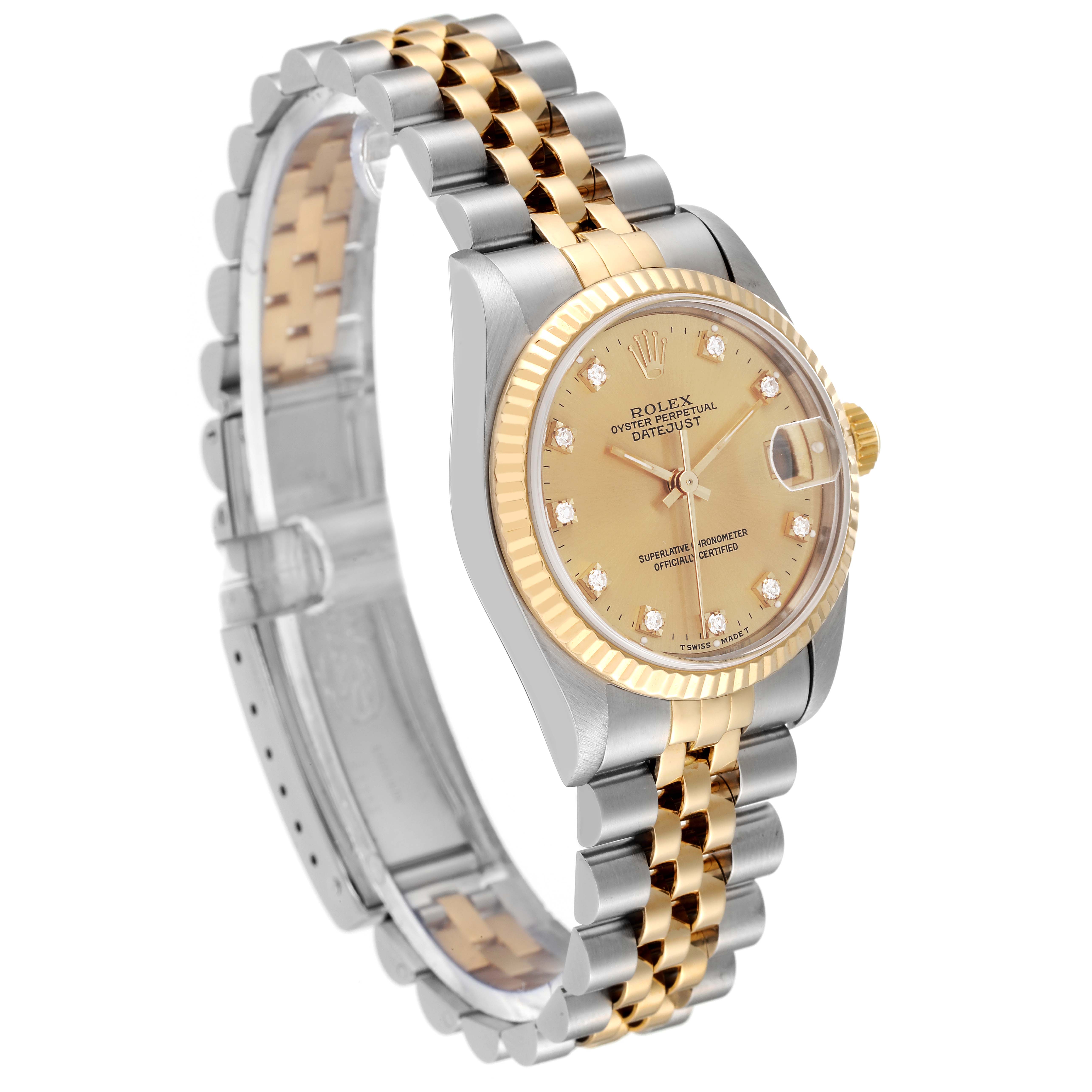 The watch is a Rolex Mid-Size 68273 Women's Steel and Gold (two tone) Champagne Dial 68273 Women's Steel and Gold (two tone) Champagne Dial model showing a side angle featuring the bracelet, dial, and bezel.