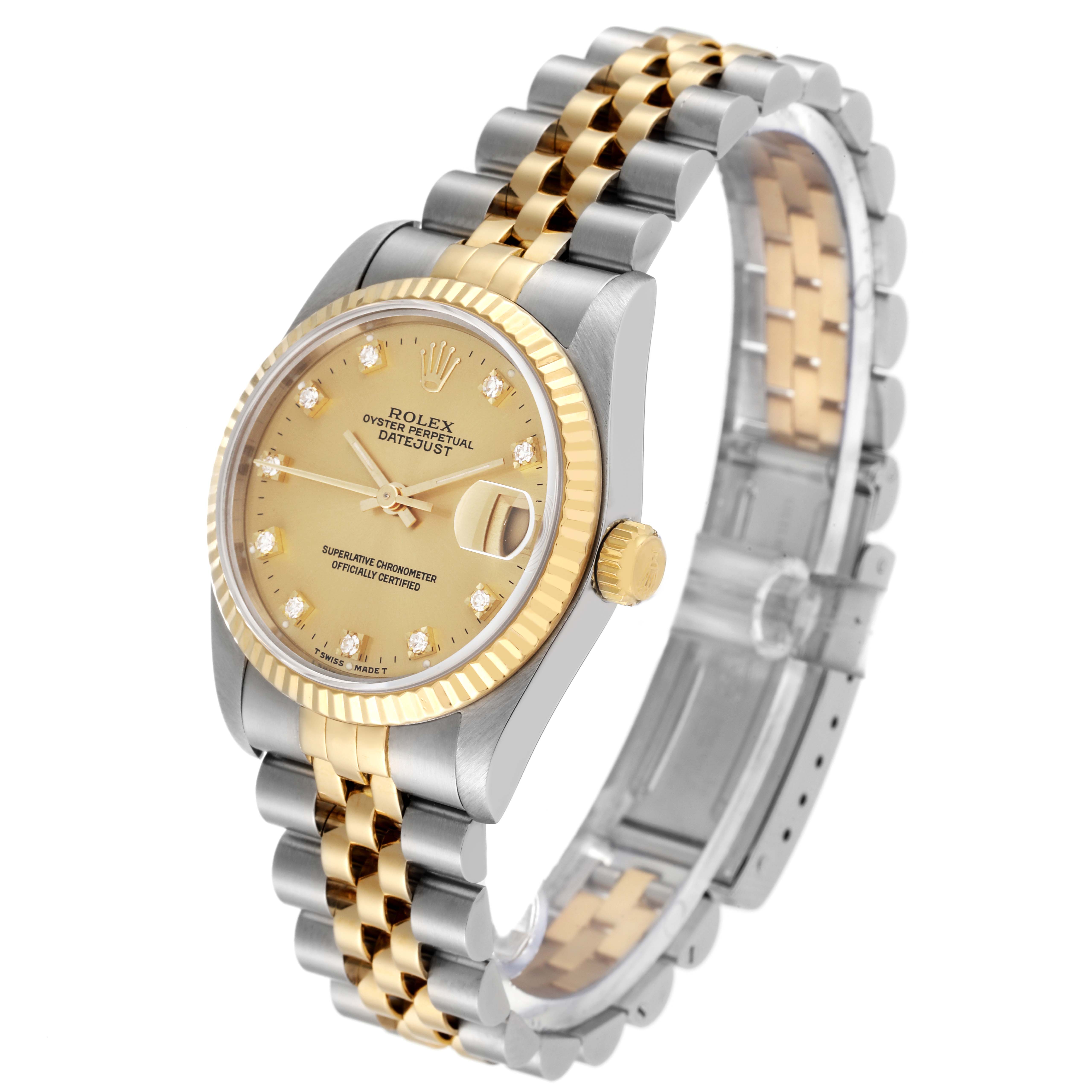 This image shows a Rolex Mid-Size 68273 Women's Steel and Gold (two tone) Champagne Dial 68273 Women's Steel and Gold (two tone) Champagne Dial Datejust watch at a three-quarter angle, highlighting the face, bezel, crown, and two-tone bracelet.