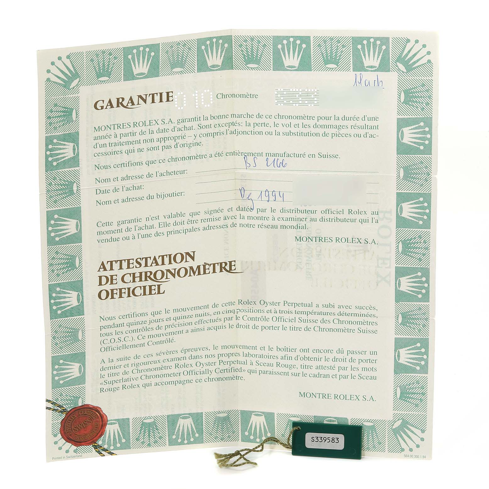 This image shows a guarantee certificate for a Mid-Size Rolex watch, highlighting its certification and warranty details.