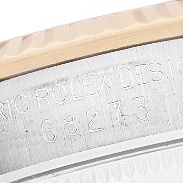 This image shows the engraved side view of a Mid-Size Rolex watch case with the model number 68273.