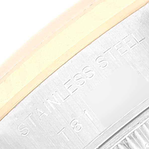 This image shows a close-up of the side of a Rolex Datejust 69173 Women's Steel and Gold (two tone) Silver Dial 69173 Women's Steel and Gold (two tone) Silver Dial watch, highlighting the stainless steel case with engraved text.