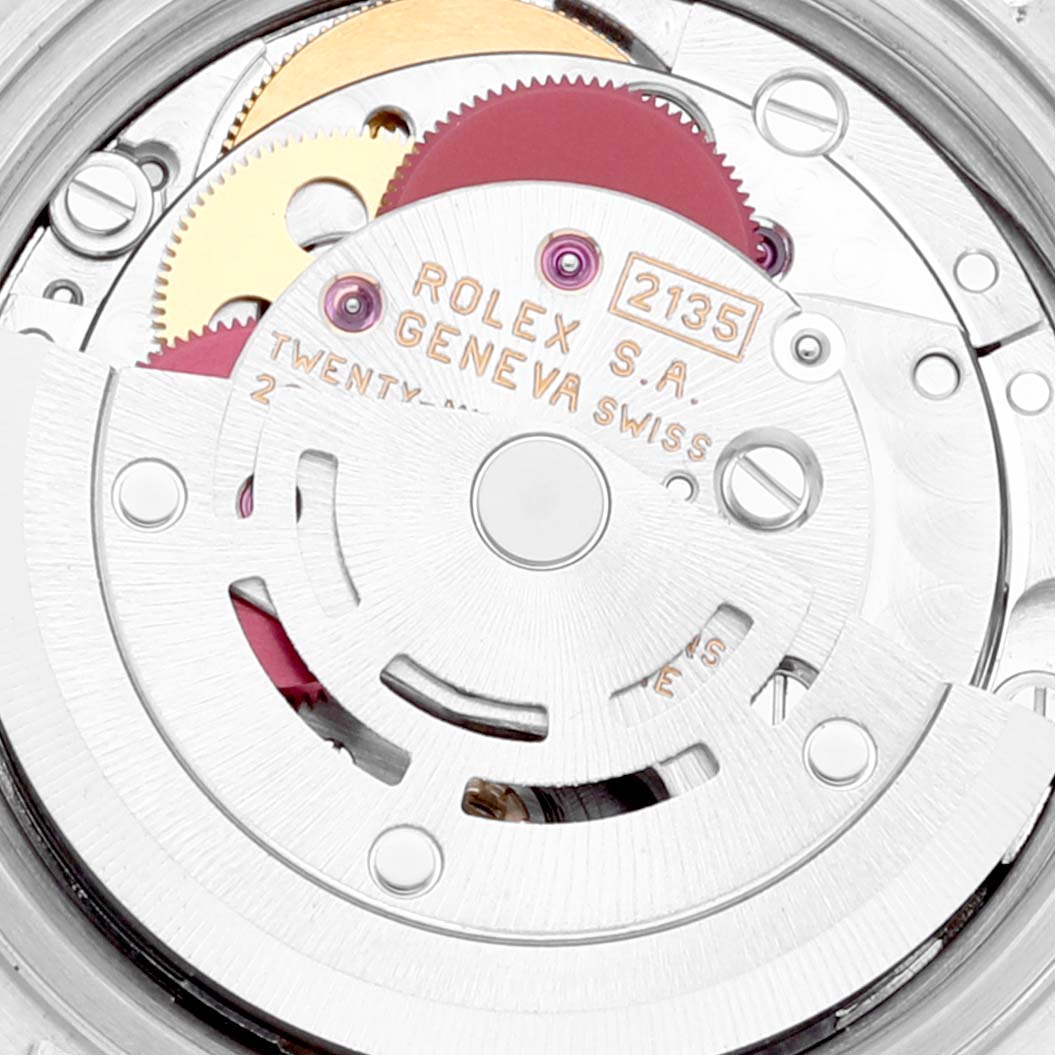 This is a detailed view of the movement mechanism inside a Rolex Datejust 69173 Women's Steel and Gold (two tone) Silver Dial 69173 Women's Steel and Gold (two tone) Silver Dial watch.