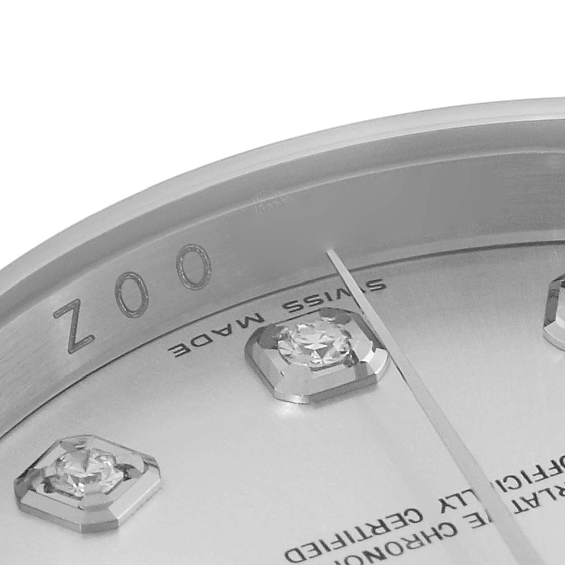 The image shows a close-up of the dial and diamonds of a Rolex Datejust 116234 Men's Stainless Steel Silver Dial 116234 Men's Stainless Steel Silver Dial watch, capturing the words "Swiss Made."