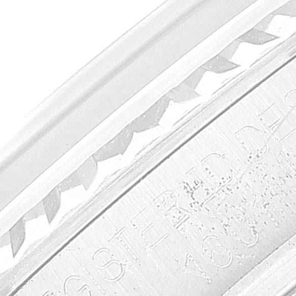 This close-up image shows the engraved markings on the inner bezel ring of the Rolex Vintage Collection 1601 Men
s Stainless Steel Silver Dial 1601 Men
s Stainless Steel Silver Dial watch.