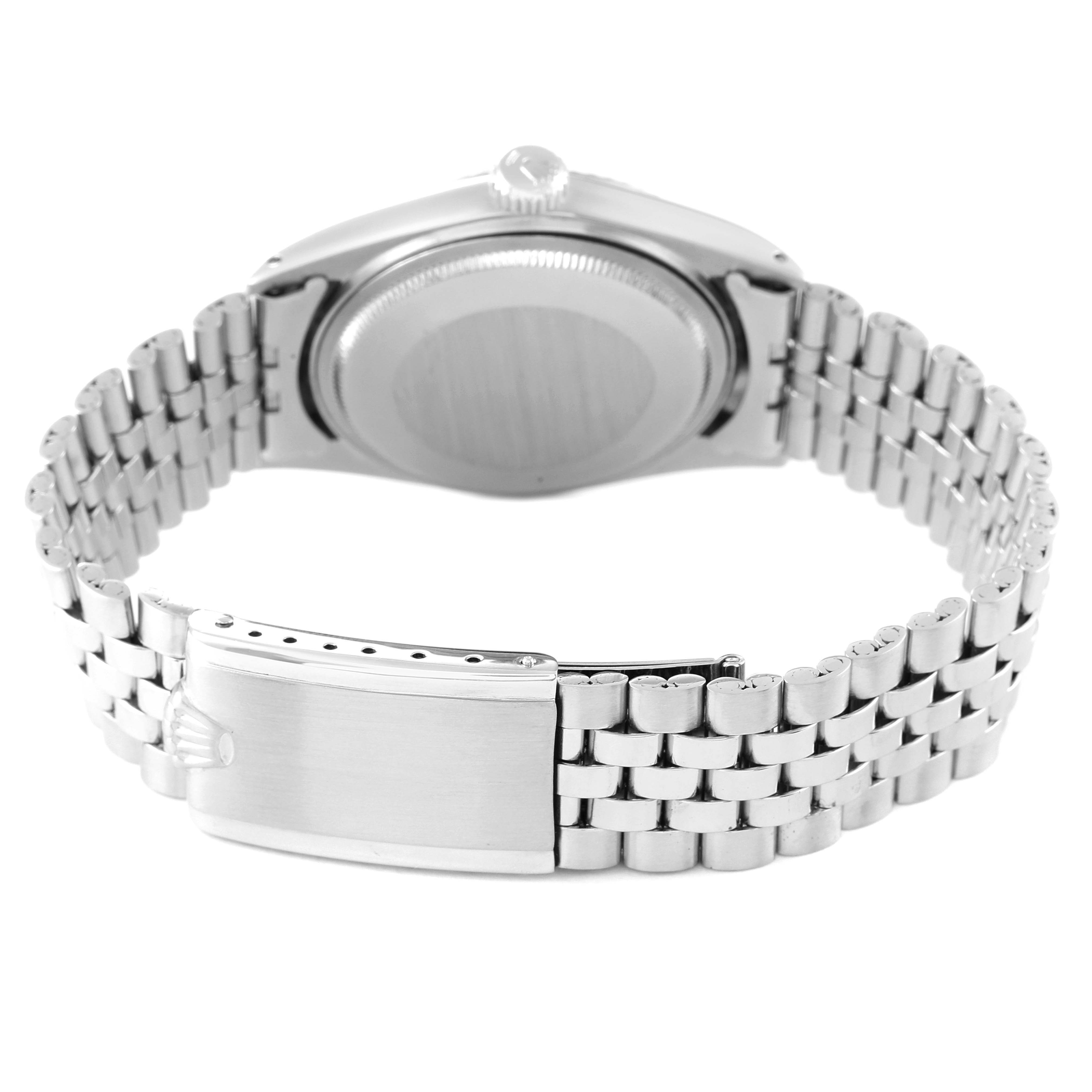 The image shows the back case and bracelet clasp of a Rolex Vintage Collection 1601 Men
s Stainless Steel Silver Dial 1601 Men
s Stainless Steel Silver Dial model watch from an angled rear view.