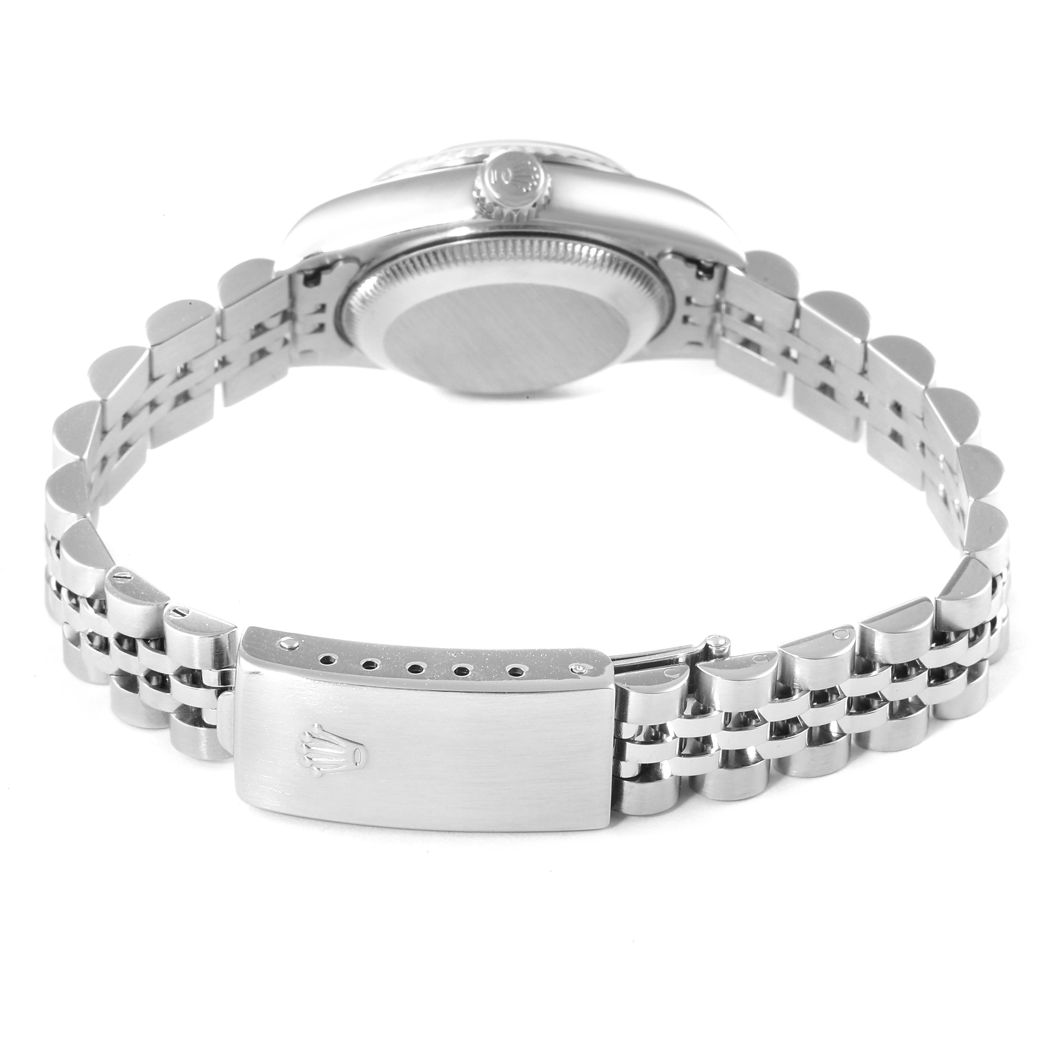 This image shows the back view of a Rolex Datejust 79174 Women's Stainless Steel White Dial 79174 Women's Stainless Steel White Dial watch, focusing on its case back and Jubilee bracelet with the clasp.