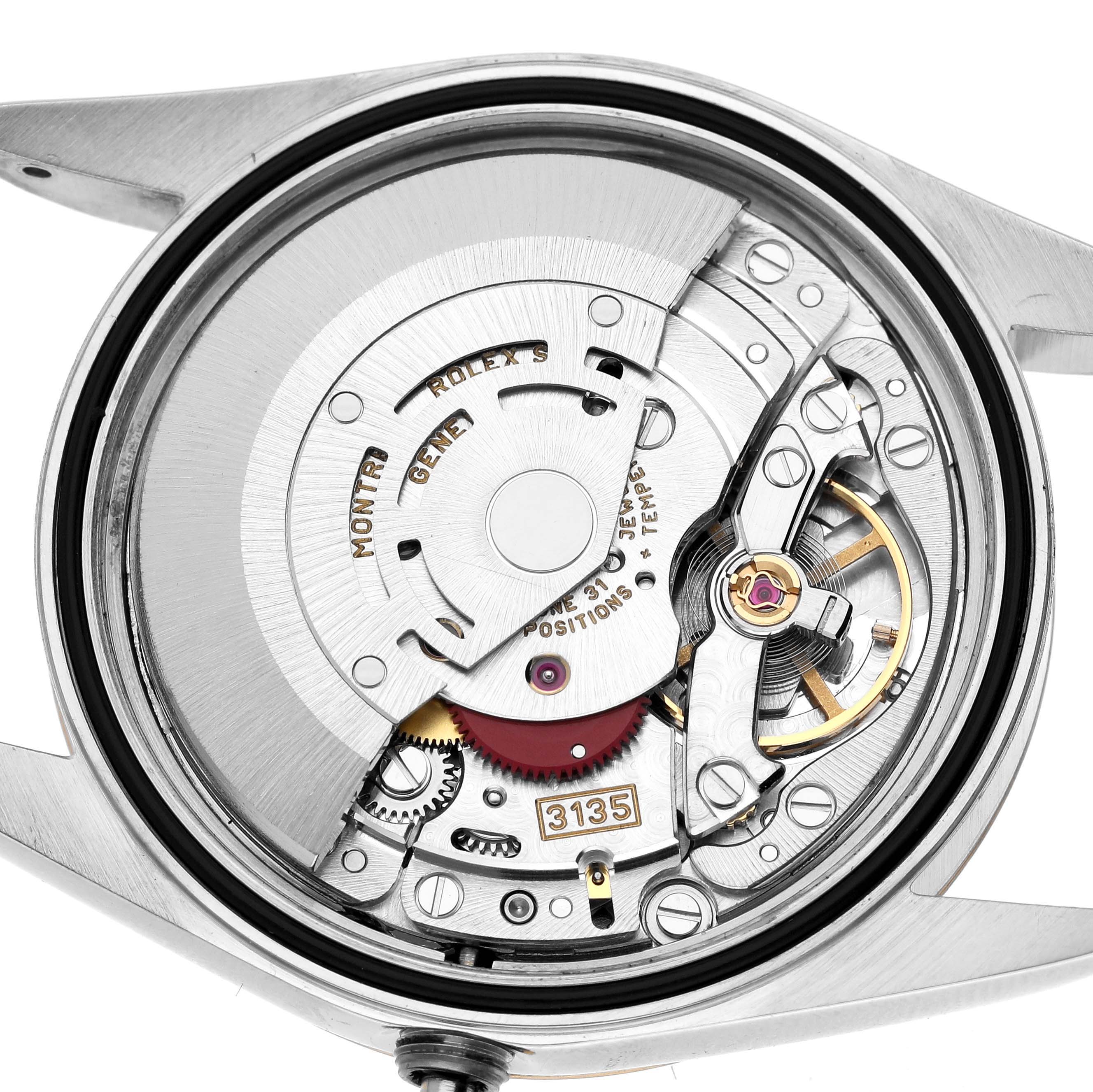 The image shows the movement mechanism of a Rolex Datejust 16203 Men's Steel and Gold (two tone) Black Dial watch from the back case angle.