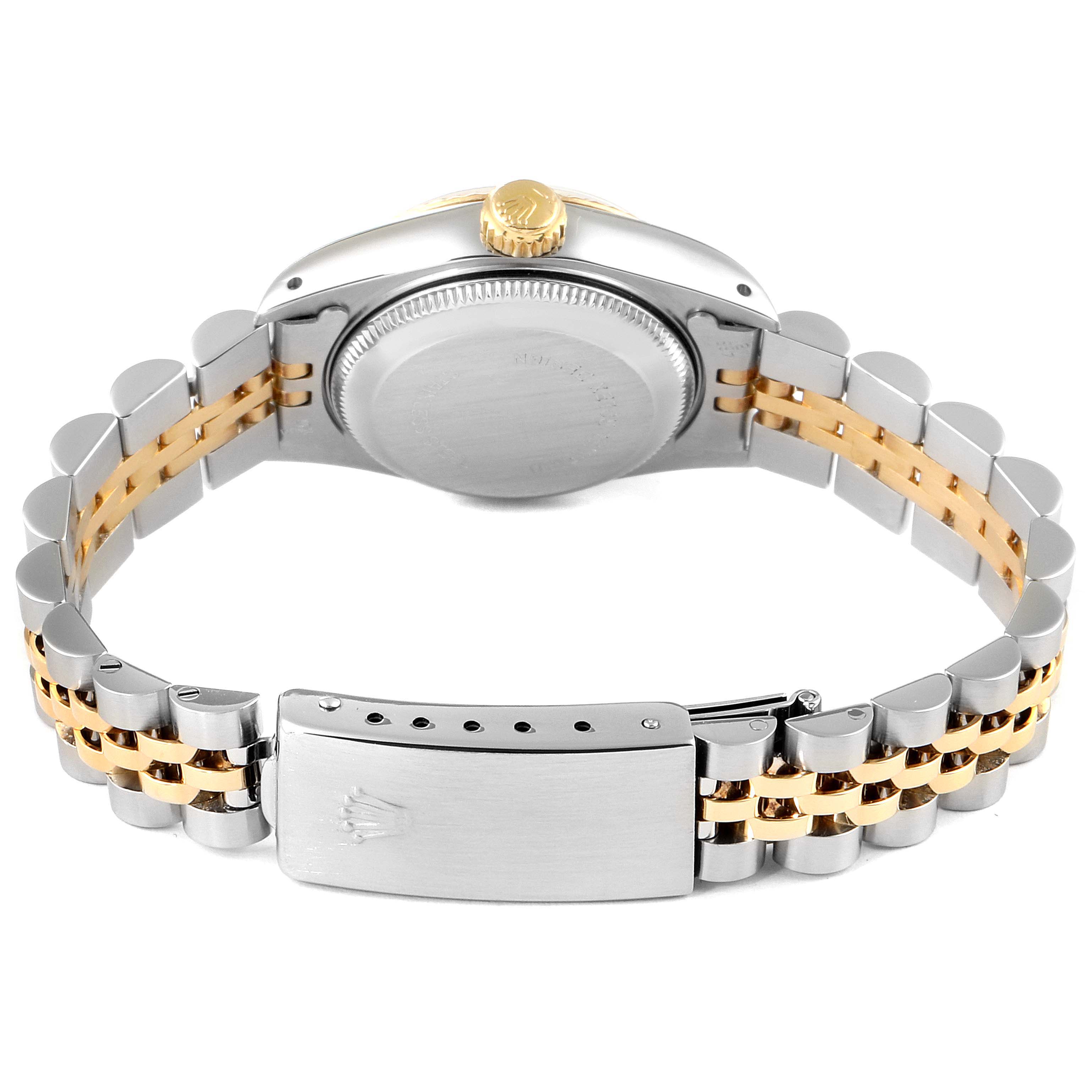 The image shows the back view of a Datejust Rolex watch, focusing on the case back and two-toned bracelet.