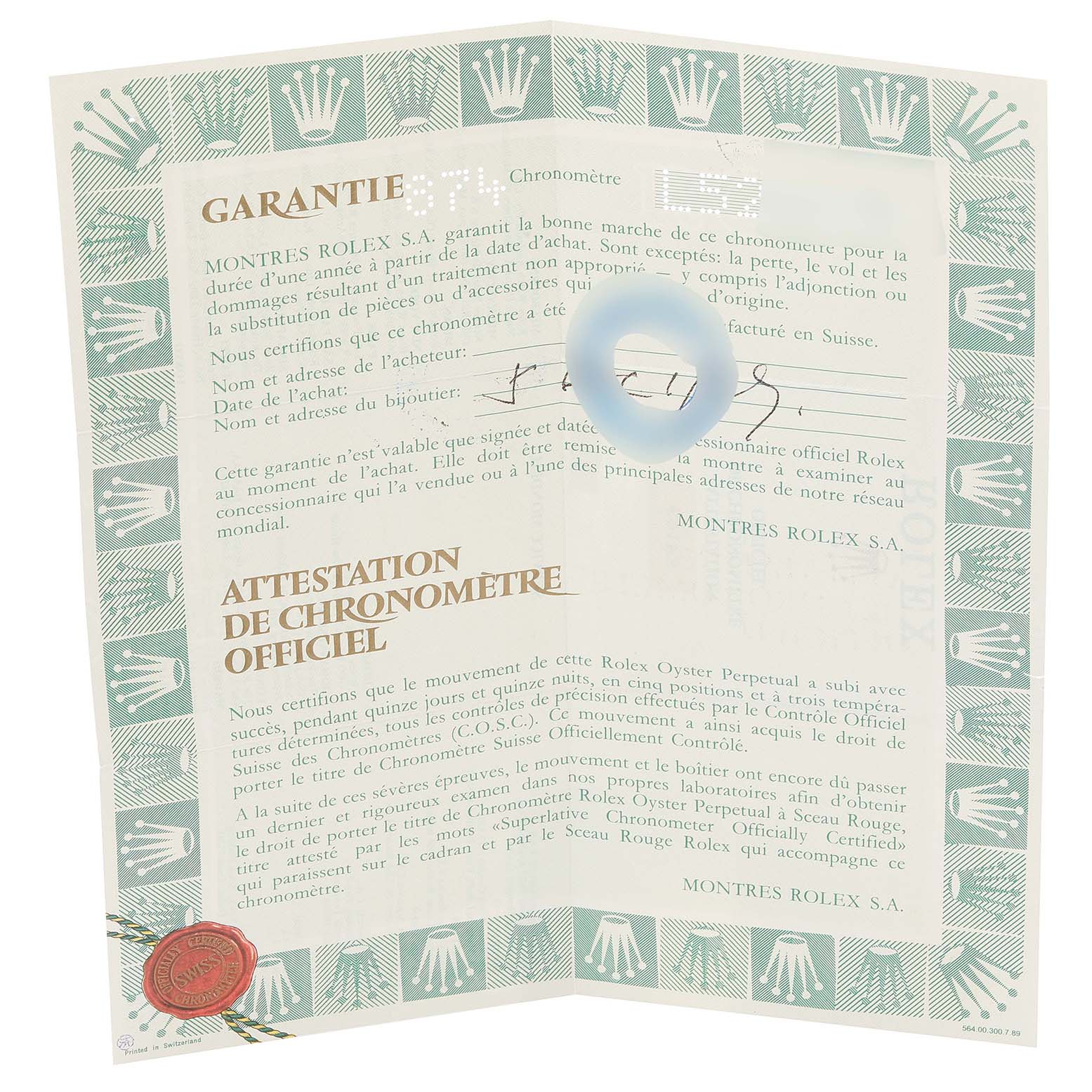 This is a certificate of authenticity and warranty card for a Rolex Datejust 69173 Women's Steel and Gold (two tone) White Dial 69173 Women's Steel and Gold (two tone) White Dial model.