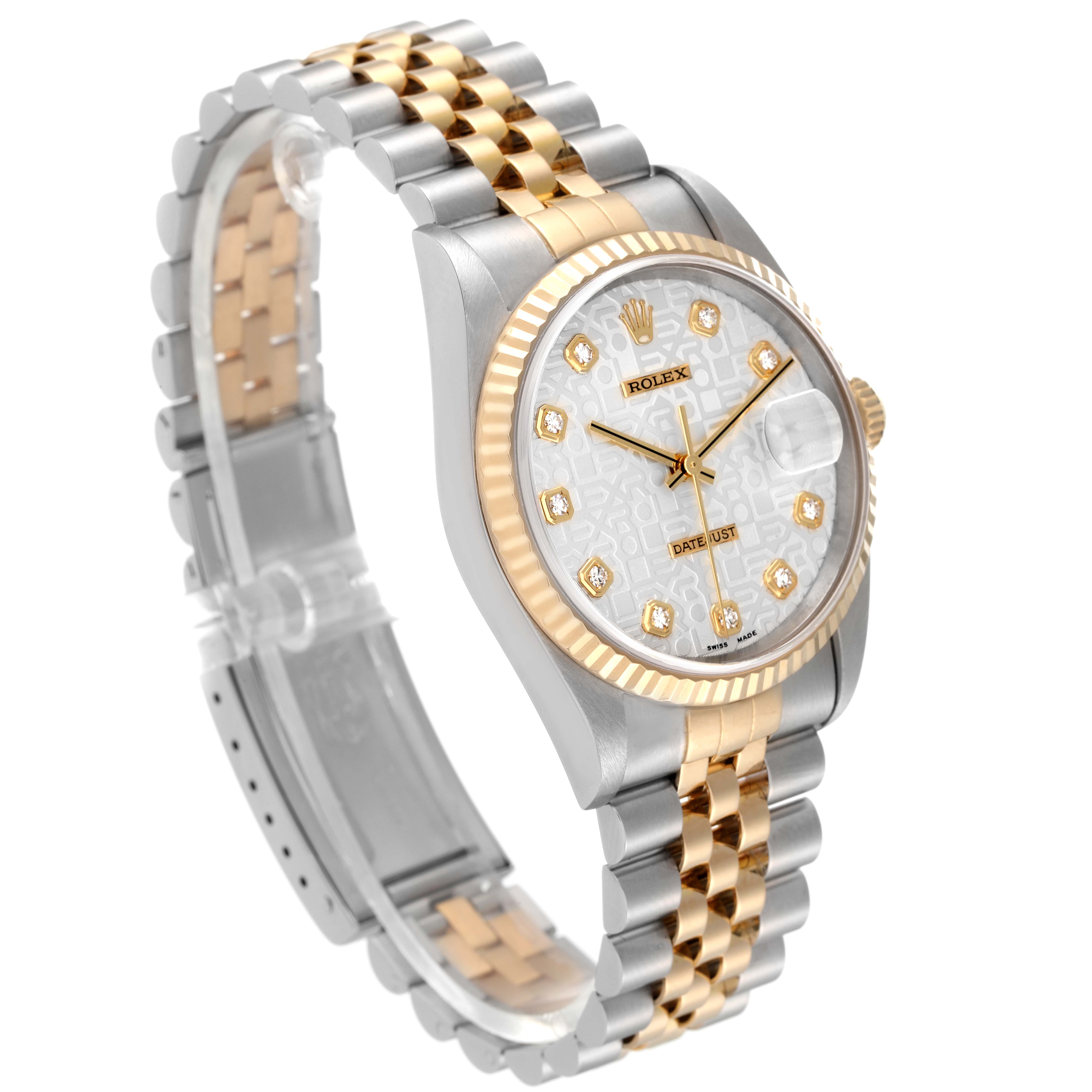 This image shows a Rolex Datejust 16233 Men's Steel and Gold (two tone) Silver Dial 16233 Men's Steel and Gold (two tone) Silver Dial watch at an angle, highlighting its two-tone bracelet, fluted bezel, and diamond hour markers.