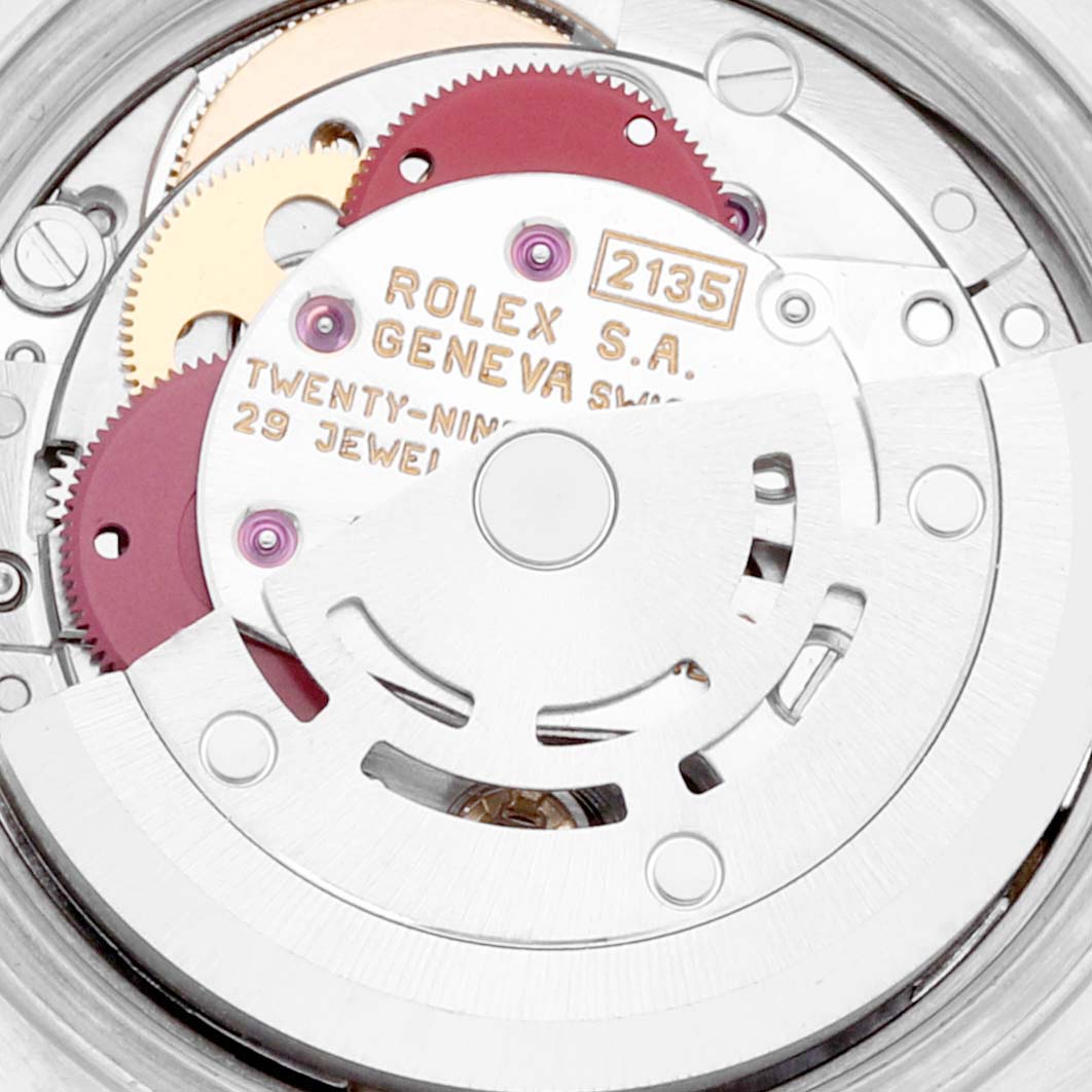 The image shows a close-up view of the movement mechanism of a Rolex Datejust 69173 Women's Steel and Gold (two tone) White Dial 69173 Women's Steel and Gold (two tone) White Dial watch.