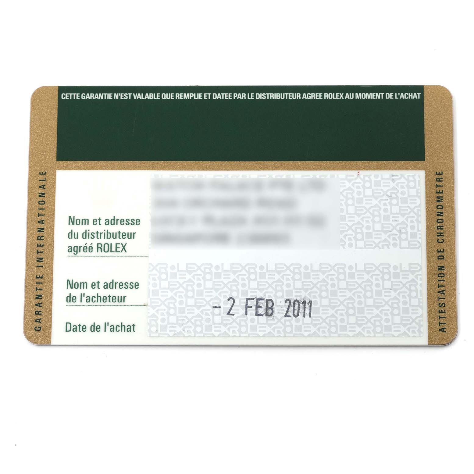 This image shows the warranty card for a Rolex Daytona 116523 Men's Steel and Gold (two tone) Mother of Pearl Dial 116523 Men's Steel and Gold (two tone) Mother of Pearl Dial watch, including purchase date and distributor information.