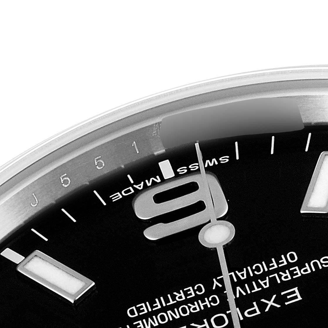 The image shows a close-up angle of the top part of the dial on a Rolex Explorer 214270 Men
s Stainless Steel Black Dial 214270 Men
s Stainless Steel Black Dial watch.