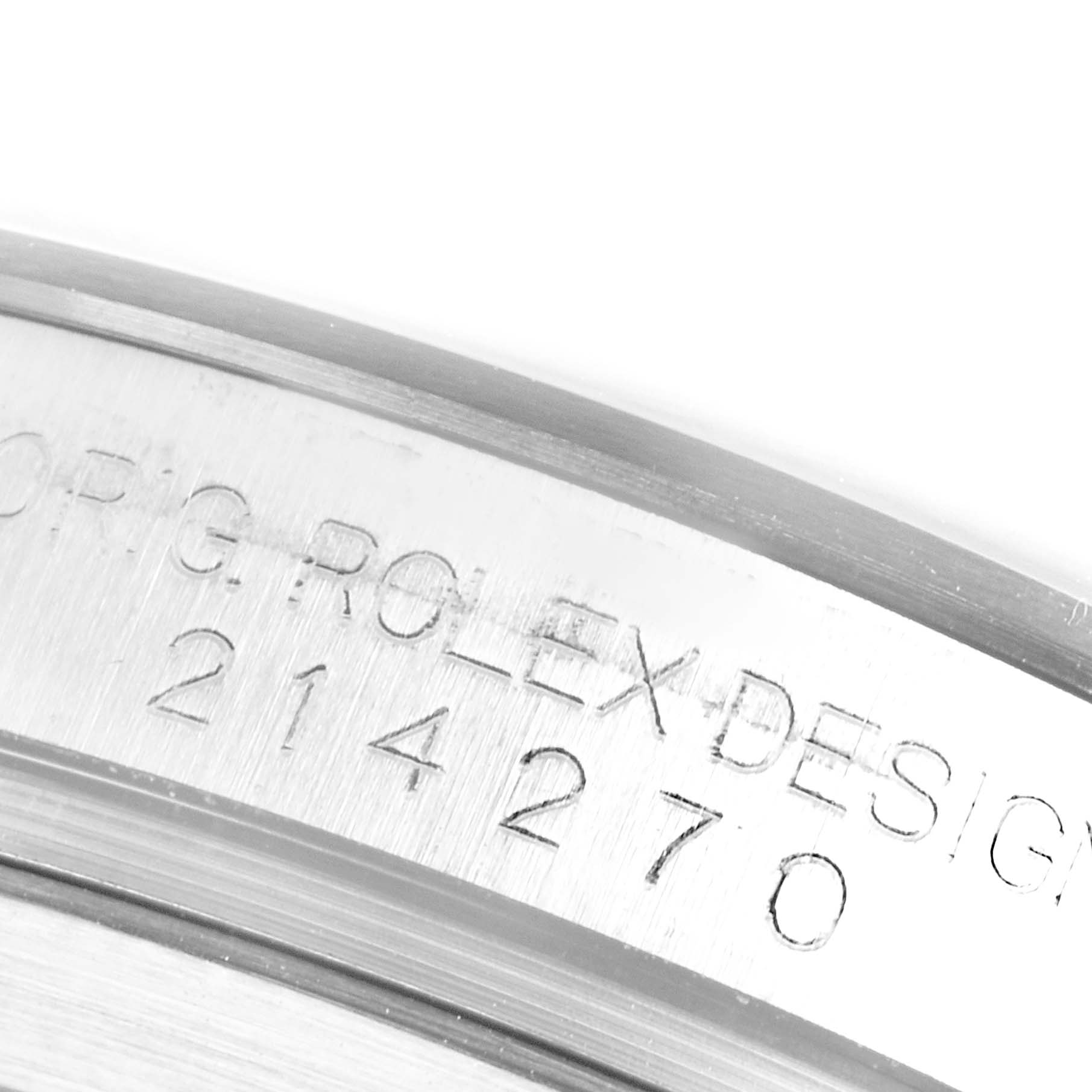 A close-up shot of the engravings on the side of a Rolex Explorer 214270 Men
s Stainless Steel Black Dial 214270 Men
s Stainless Steel Black Dial watch.