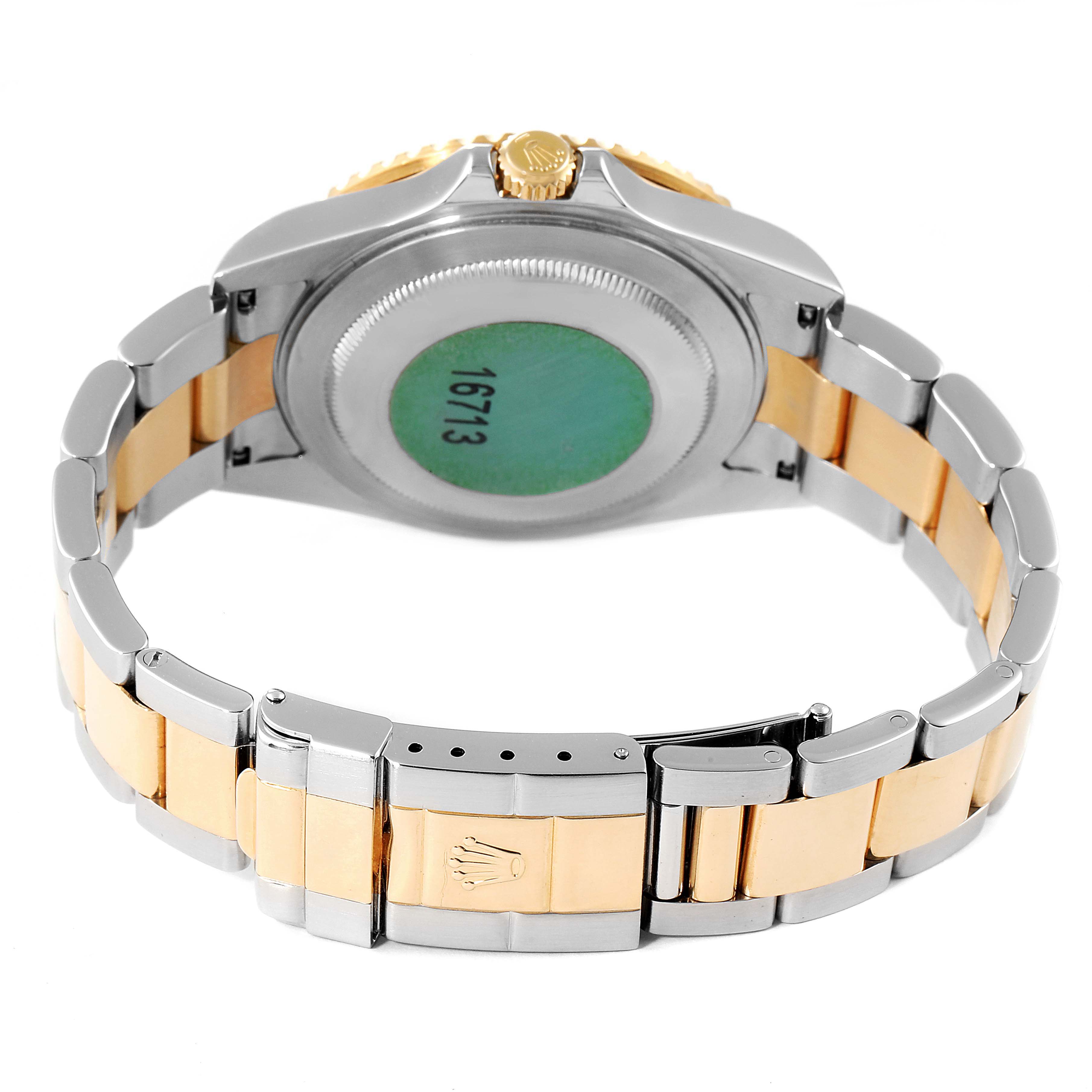 This image shows the back view and bracelet clasp of a Rolex GMT-Master 16713 Men's Steel and Gold (two tone) Black Dial 16713 Men's Steel and Gold (two tone) Black Dial watch.