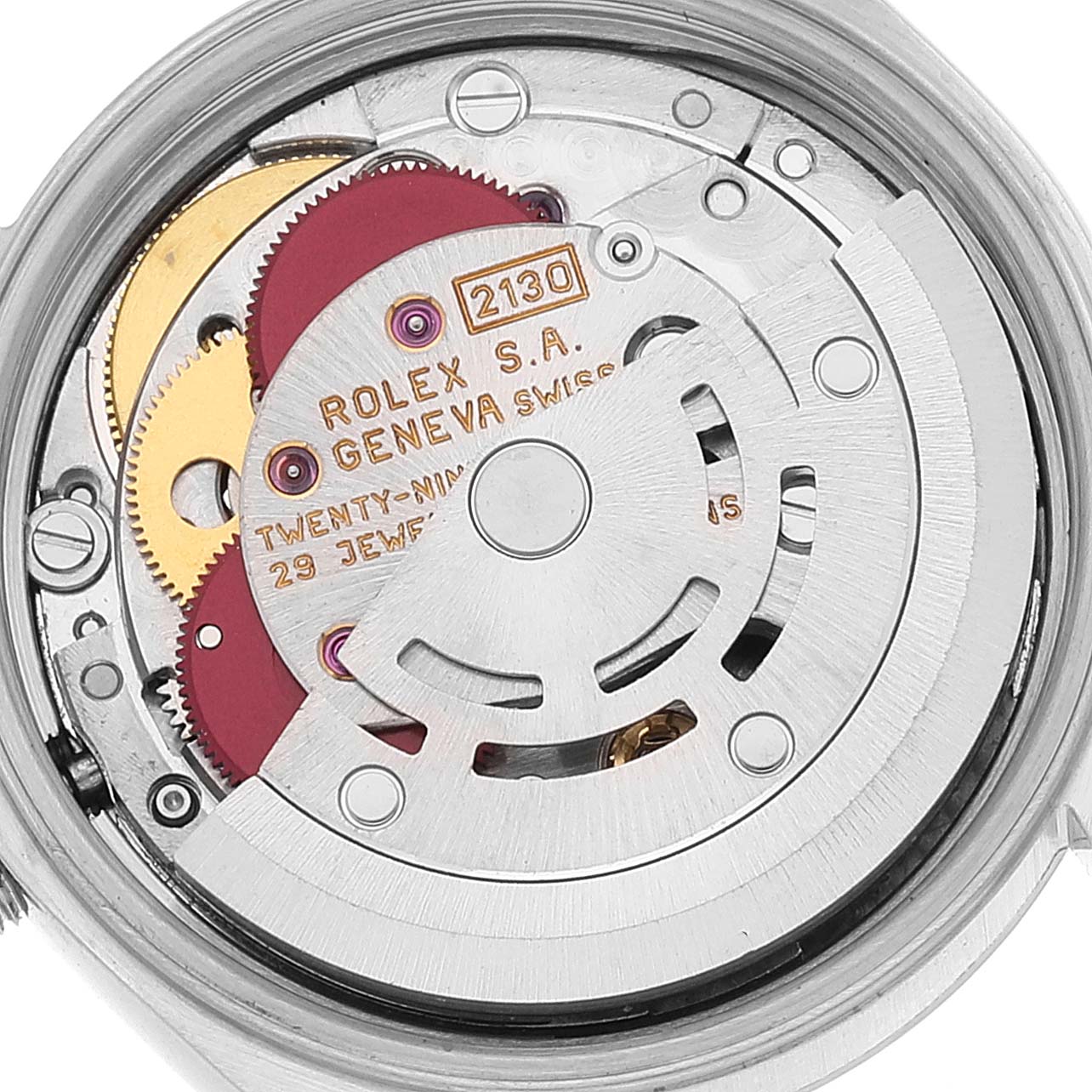 This image shows the internal mechanism of a Rolex Oyster Perpetual 67180 Women's Stainless Steel White Dial 67180 Women's Stainless Steel White Dial watch, including gears and the rotor.