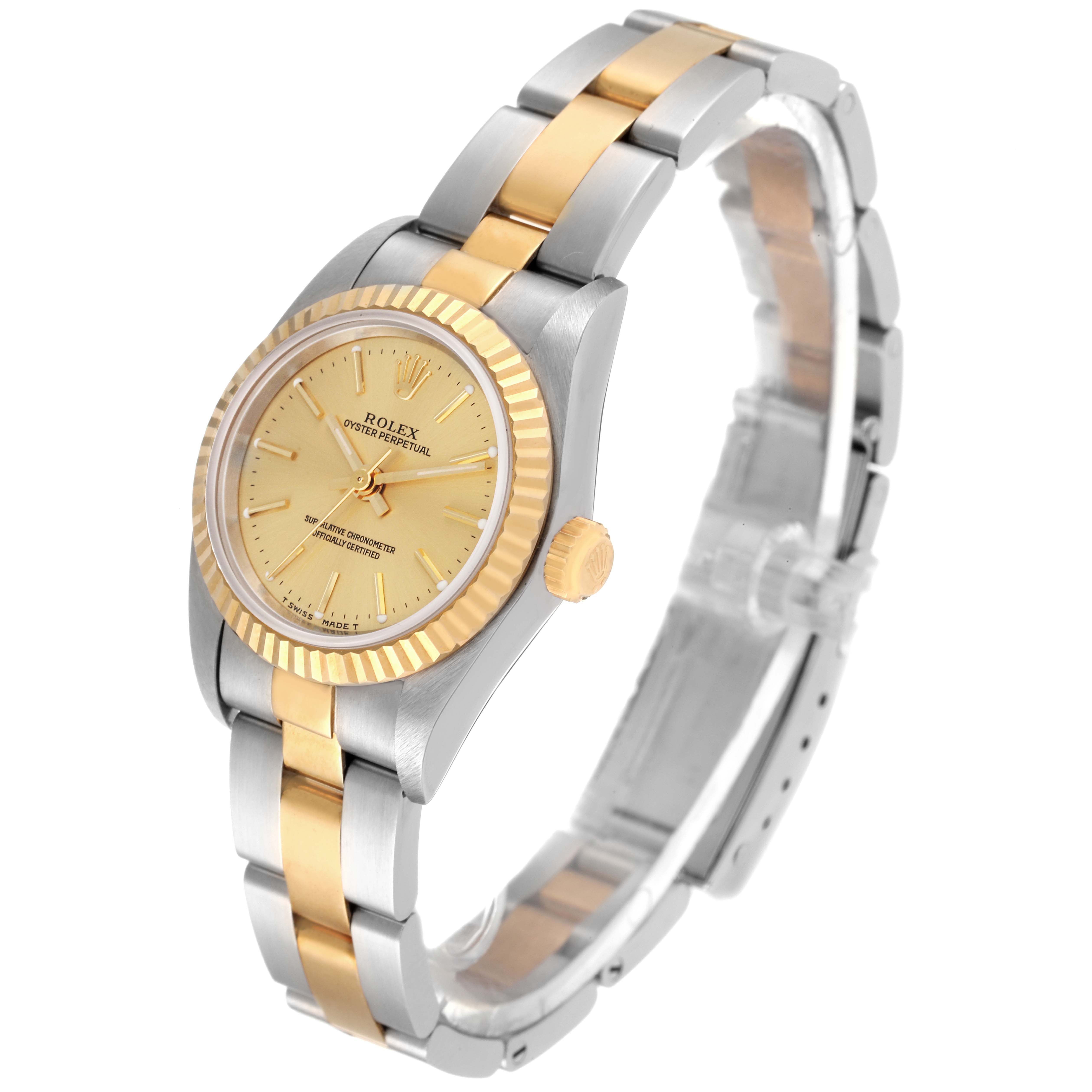 The Rolex Oyster Perpetual 76193 Women's Steel and Gold (two tone) Champagne Dial 76193 Women's Steel and Gold (two tone) Champagne Dial watch is shown at a three-quarter angle, highlighting its dual-tone bracelet, dial, bezel, and crown.