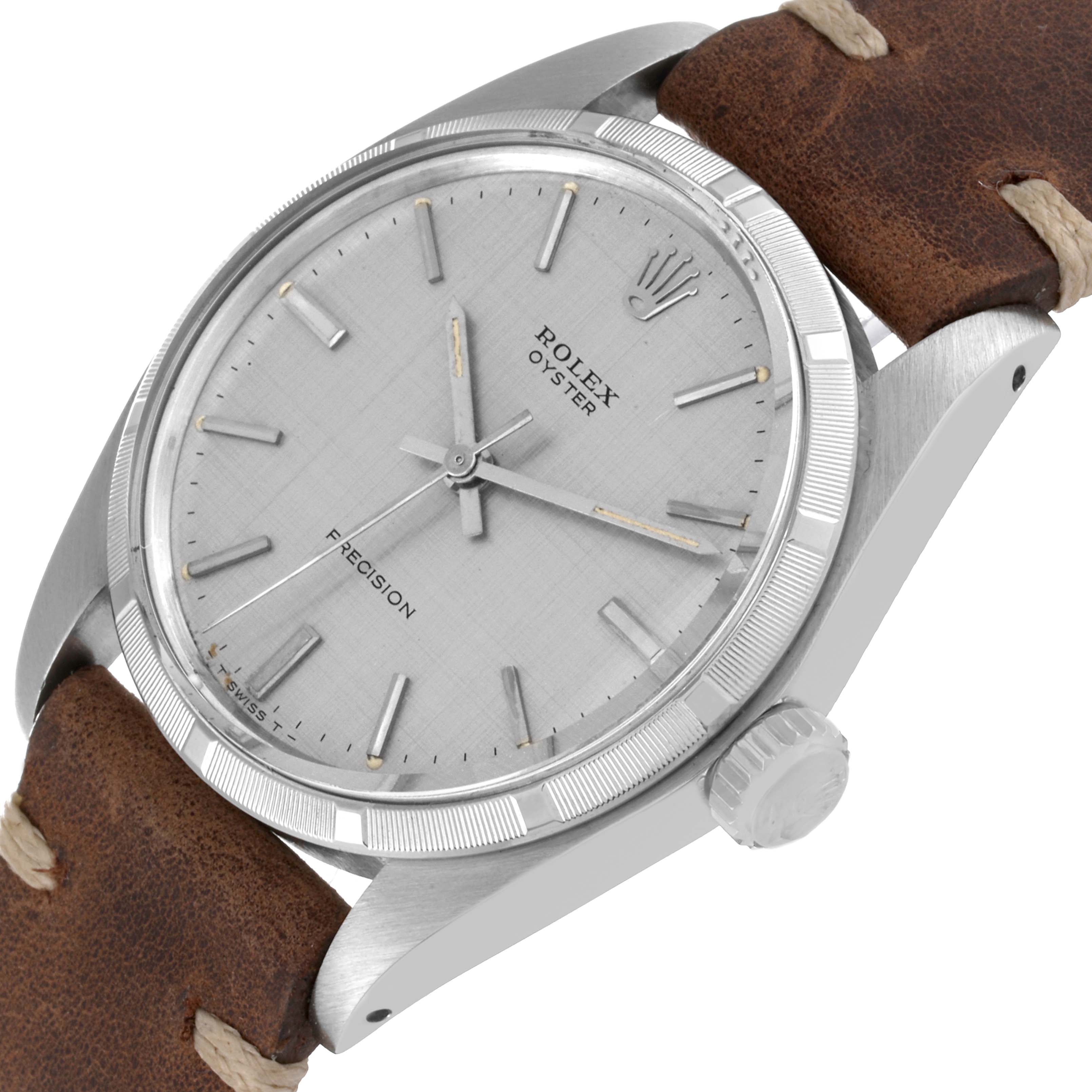 The image shows a close-up angled view of the Rolex Vintage Collection 6427 Men's Stainless Steel Silver Dial 6427 Men's Stainless Steel Silver Dial watch, highlighting the dial, bezel, crown, and leather strap.
