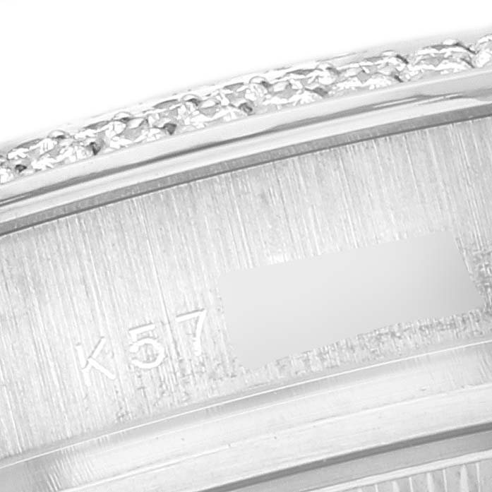 The image shows a close-up of the engraved inner bezel of a Rolex Pearlmaster 80339 Women's White Gold Mother of Pearl Dial 80339 Women's White Gold Mother of Pearl Dial watch, with part of the outer bezel fully visible.