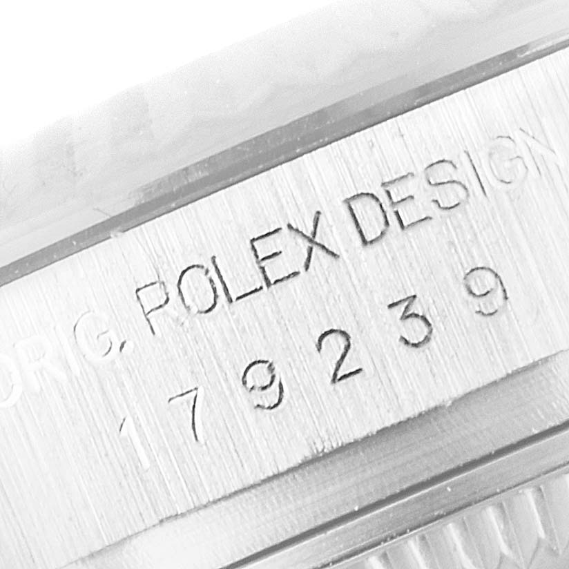 The image shows a close-up of the engraved serial number and "Rolex Design" on the case side of a Rolex President 179239 Women's White Gold Mother of Pearl Dial 179239 Women's White Gold Mother of Pearl Dial watch.